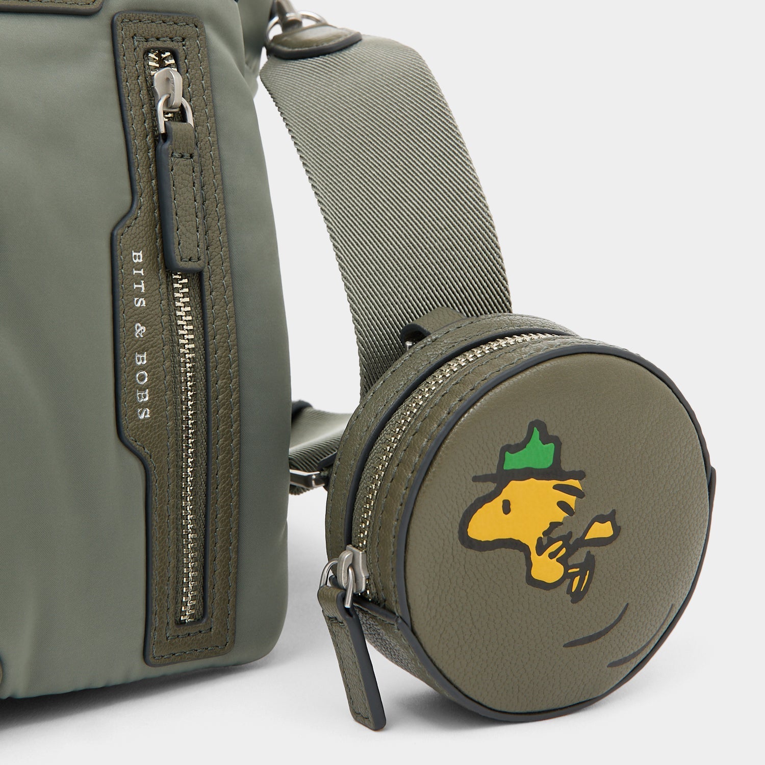 Peanuts Snoopy E/W Mini Tote -

          
            Recycled padded fabric in Fern Green -
          

          Anya Hindmarch US
