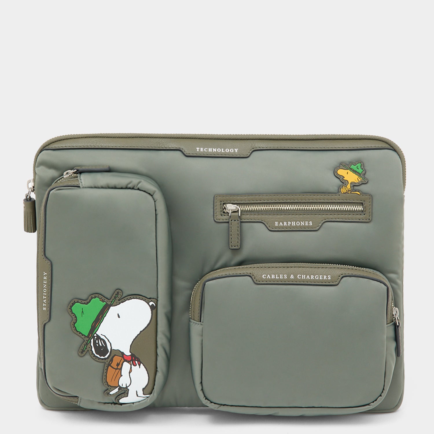 Peanuts Snoopy Tech Case -

          
            Recycled padded fabric in Fern Green -
          

          Anya Hindmarch US
