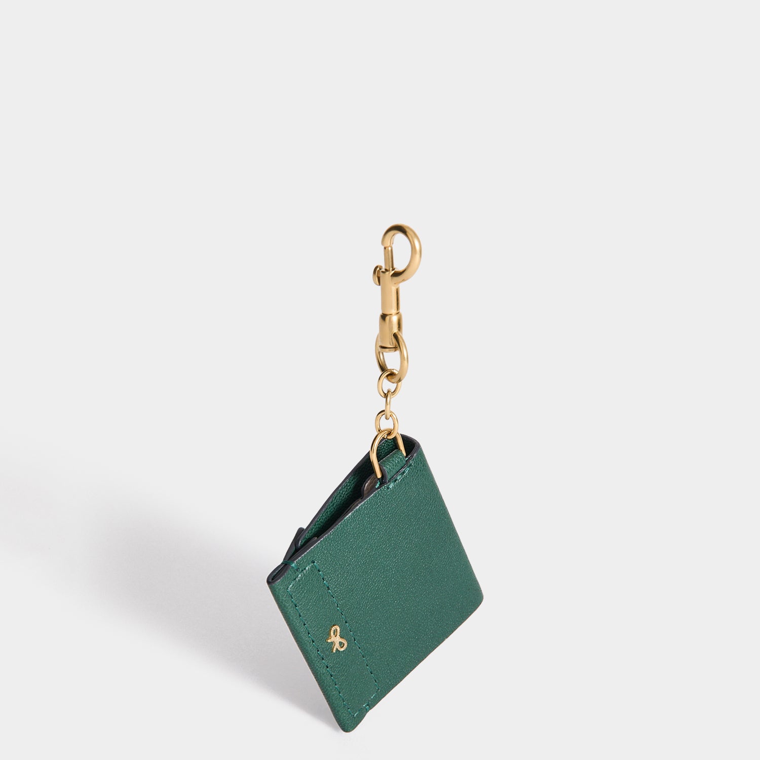 Christmas Charm -

          
            Capra Leather in Dark Green -
          

          Anya Hindmarch US
