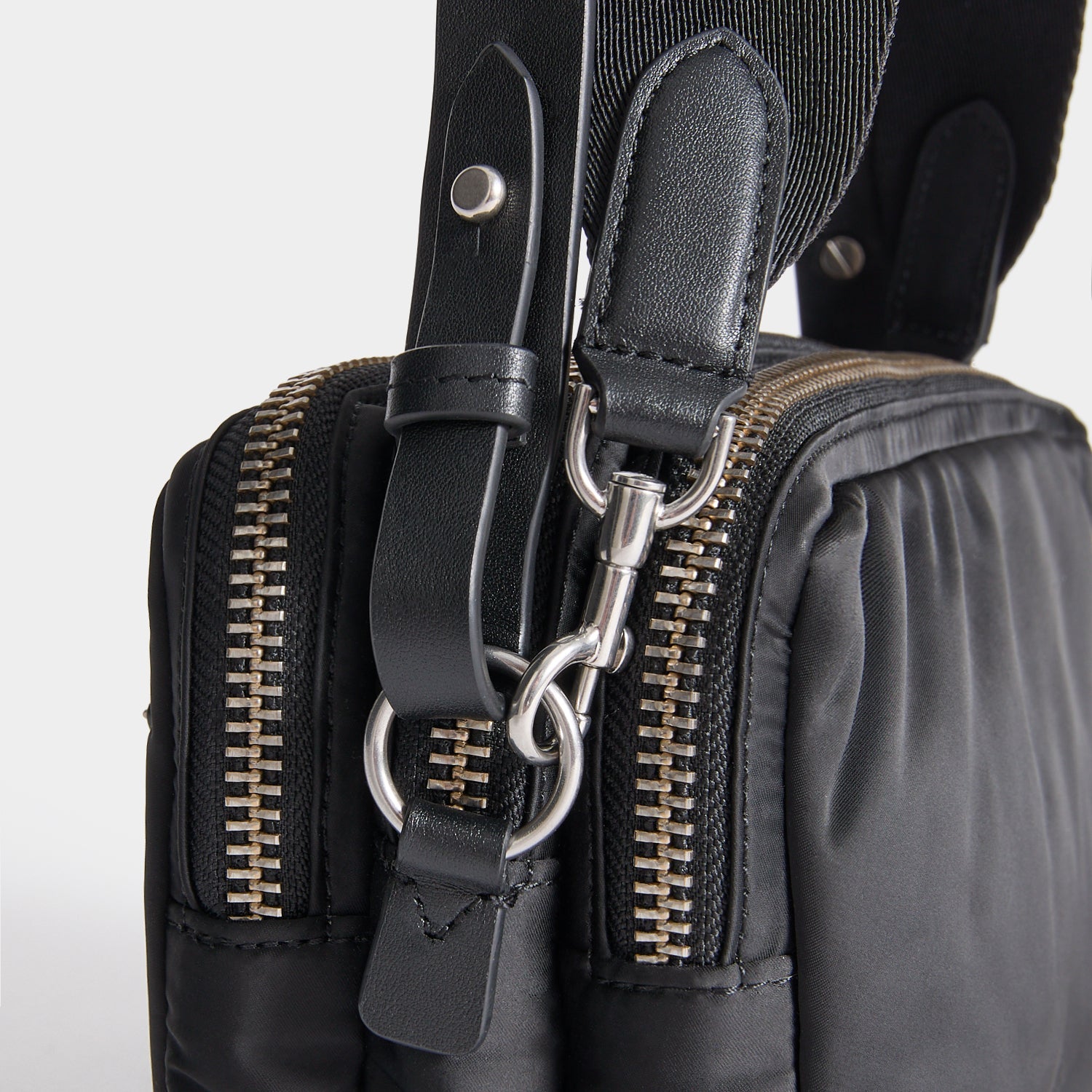 Studs Triple Zip Cross-body -

          
            Recycled Satin/Calf Leather in Black -
          

          Anya Hindmarch US
