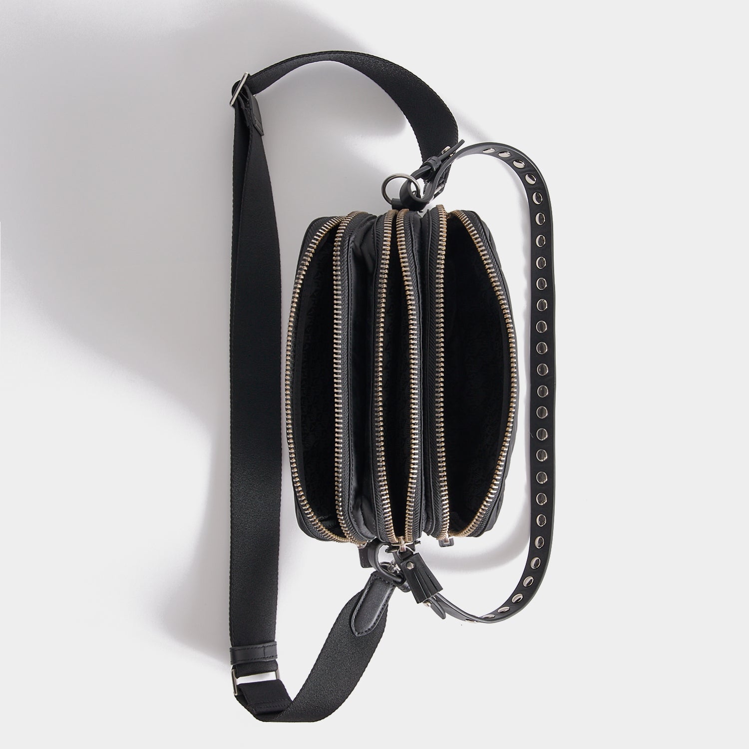 Studs Triple Zip Cross-body -

          
            Recycled Satin/Calf Leather in Black -
          

          Anya Hindmarch US
