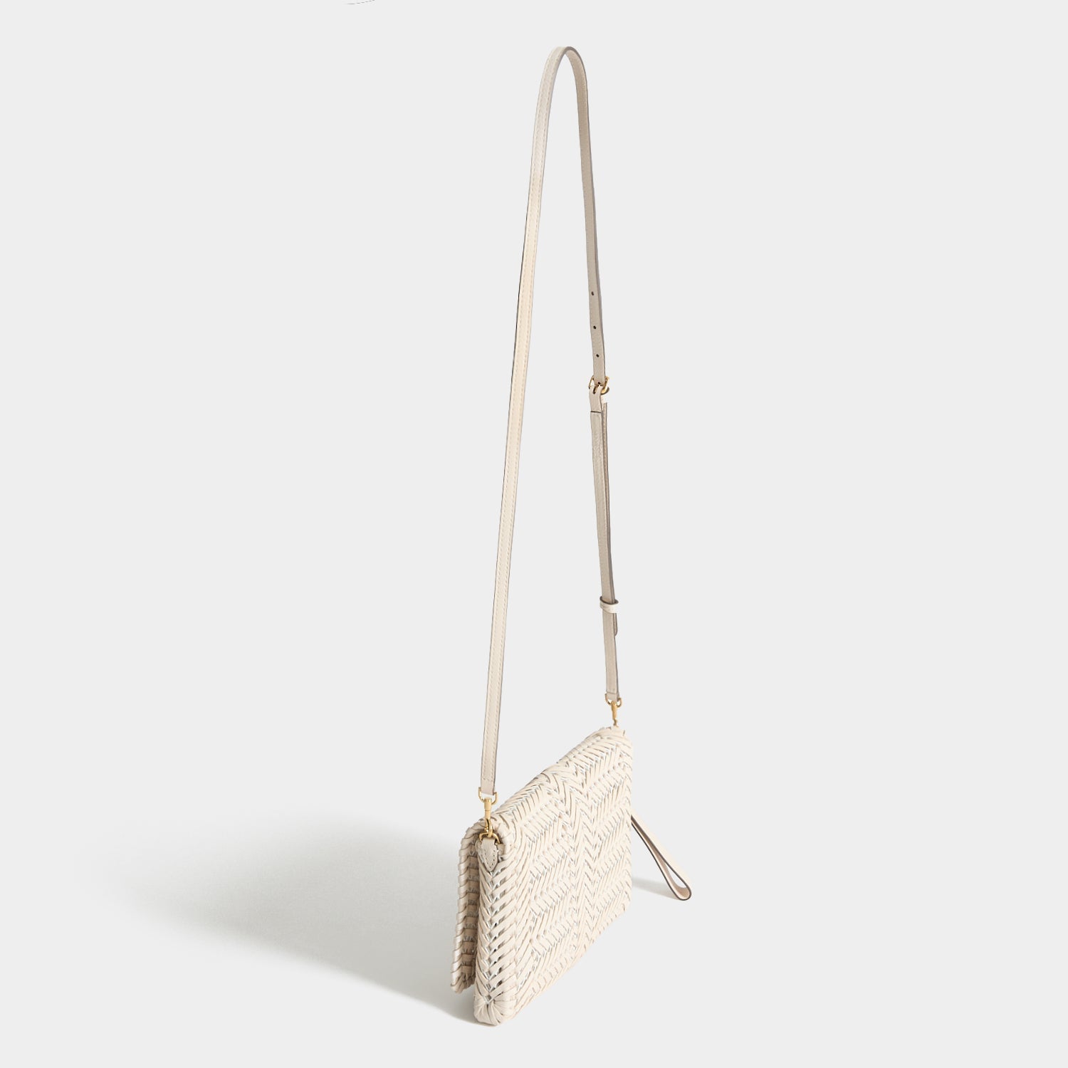 Neeson Cross-body -

          
            Capra Leather in Chalk -
          

          Anya Hindmarch US
