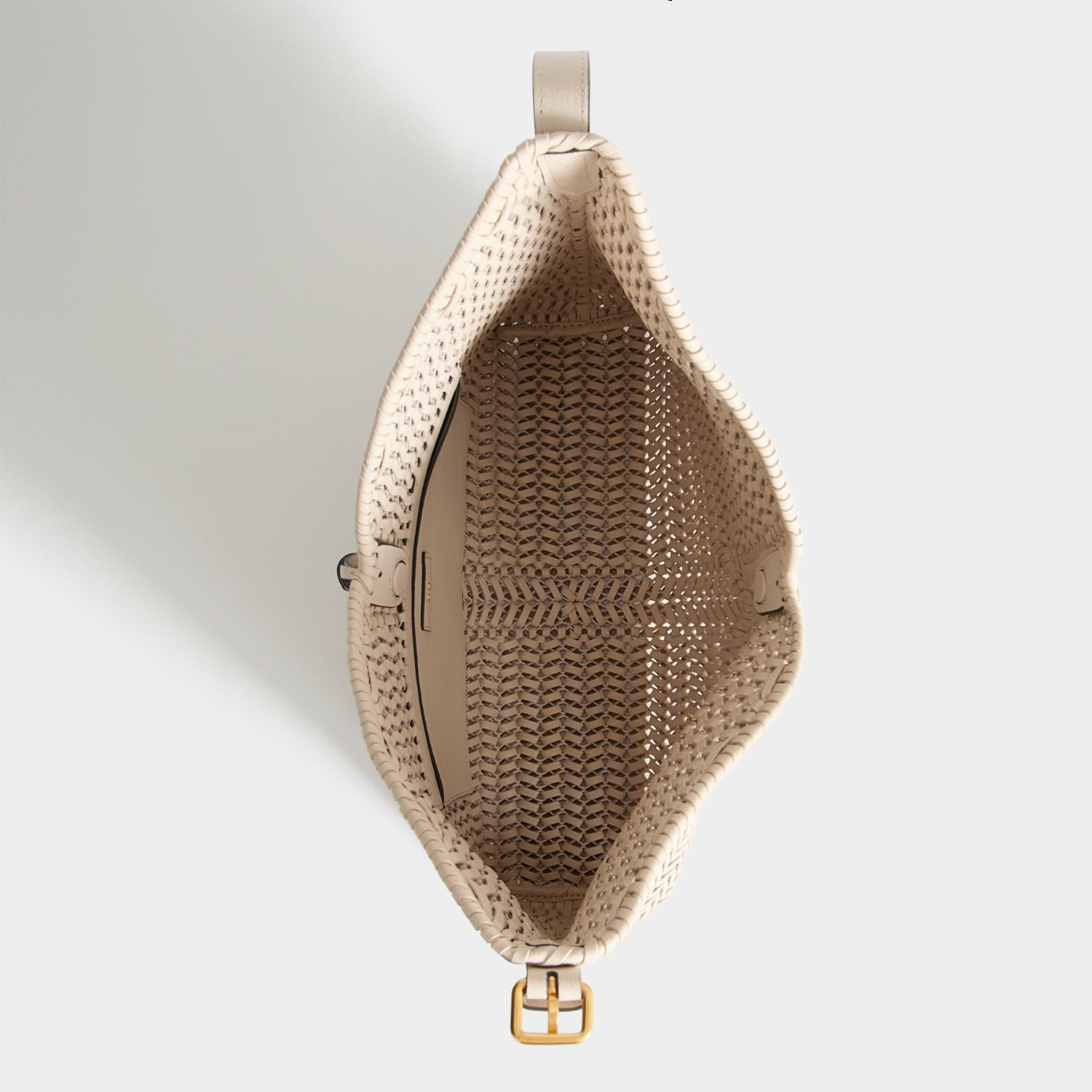 Neeson Tassel Hobo Bag -

          
            Capra Leather in Chalk -
          

          Anya Hindmarch US
