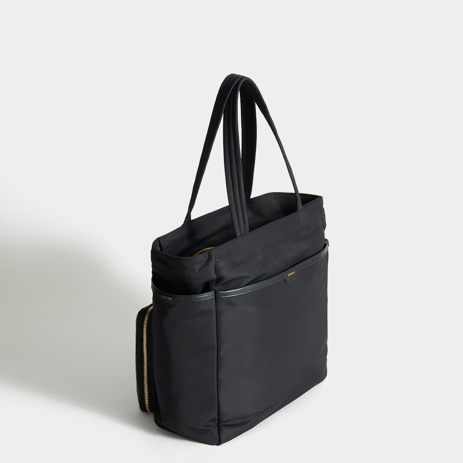Commuter Tote -

          
            Regenerated Econyl® in Black -
          

          Anya Hindmarch US
