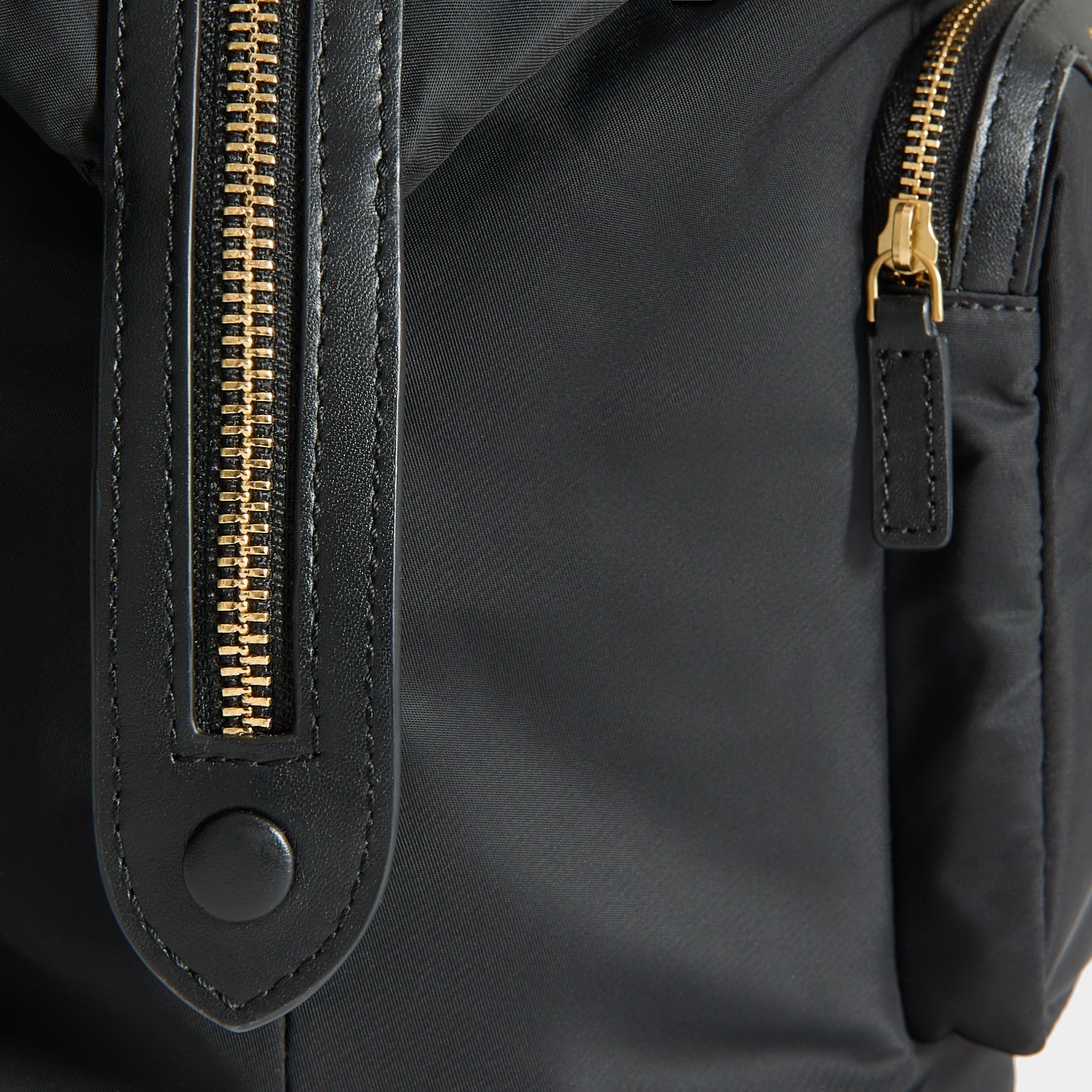 In-Flight Travel Bag -

          
            Regenerated Econyl® in Black -
          

          Anya Hindmarch US
