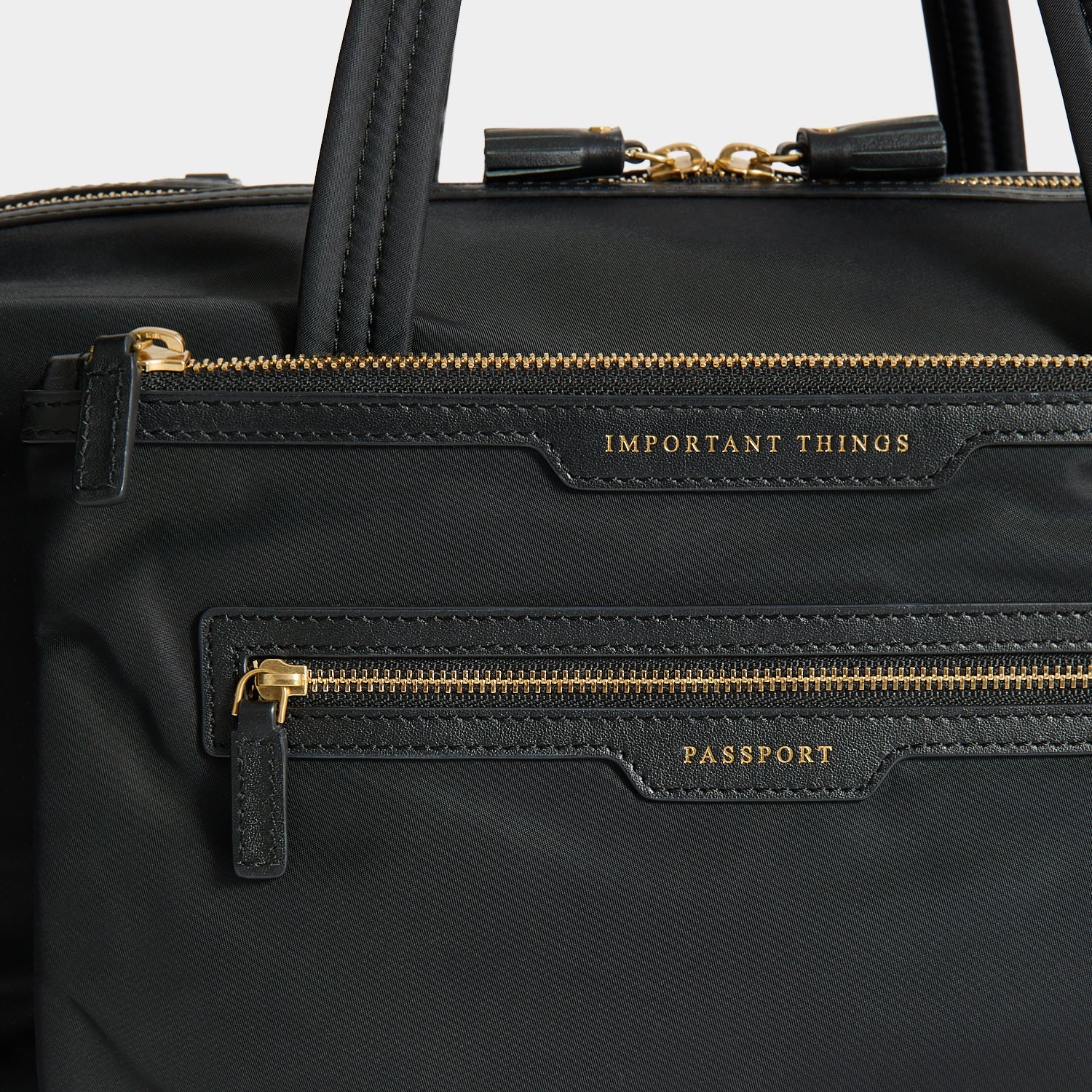 In-Flight Travel Bag -

          
            Regenerated Econyl® in Black -
          

          Anya Hindmarch US
