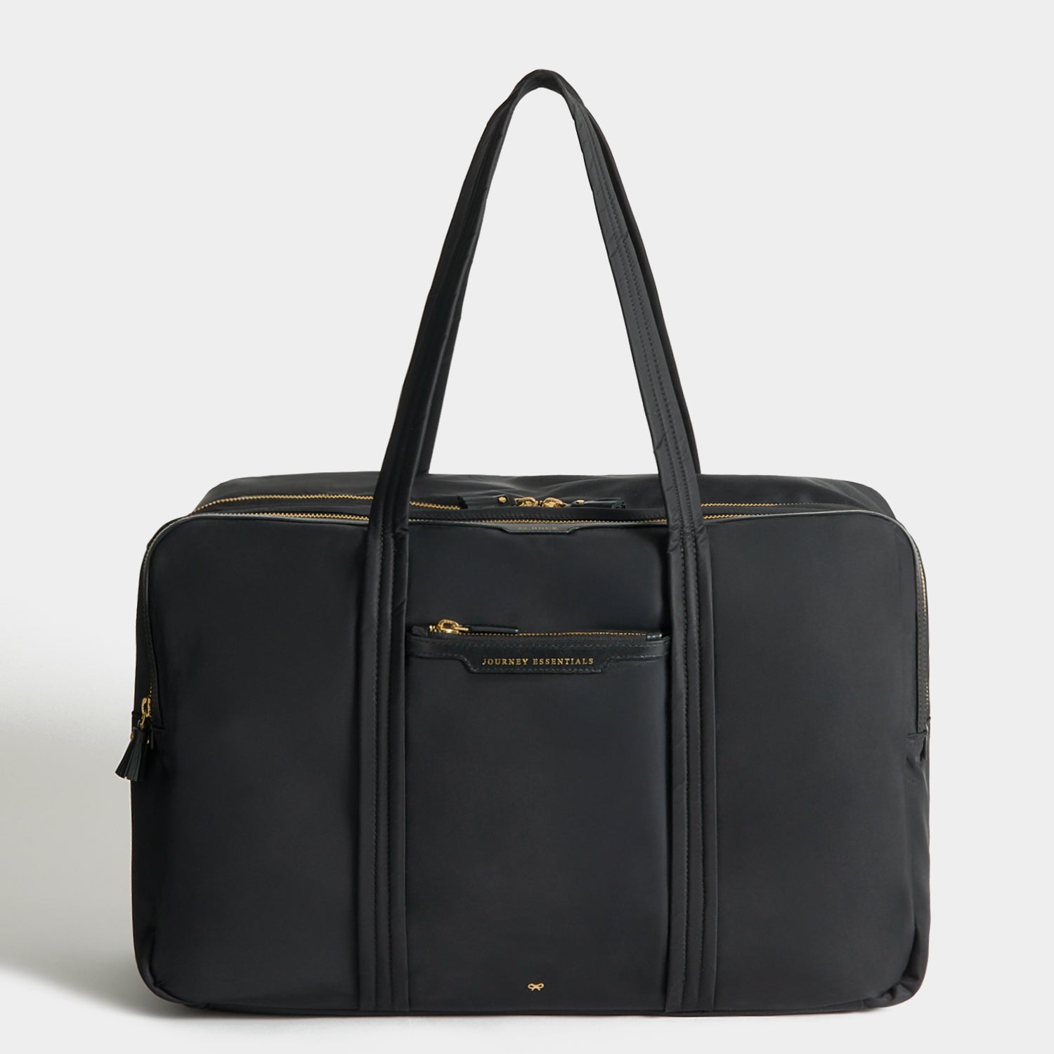 24 Hour Travel Bag -

          
            Regenerated ECONYL® in Black -
          

          Anya Hindmarch US
