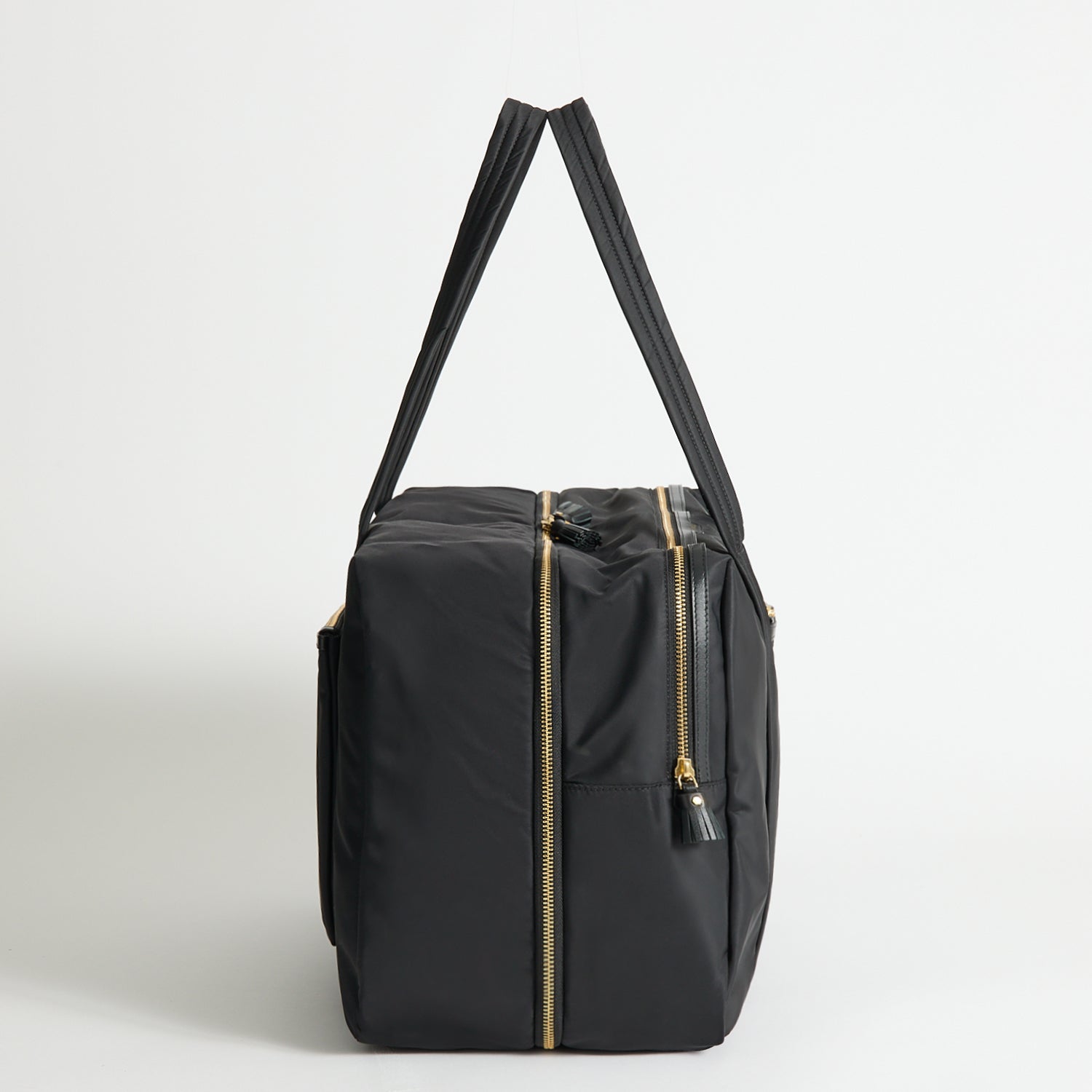 24 Hour Travel Bag -

          
            Regenerated ECONYL® in Black -
          

          Anya Hindmarch US
