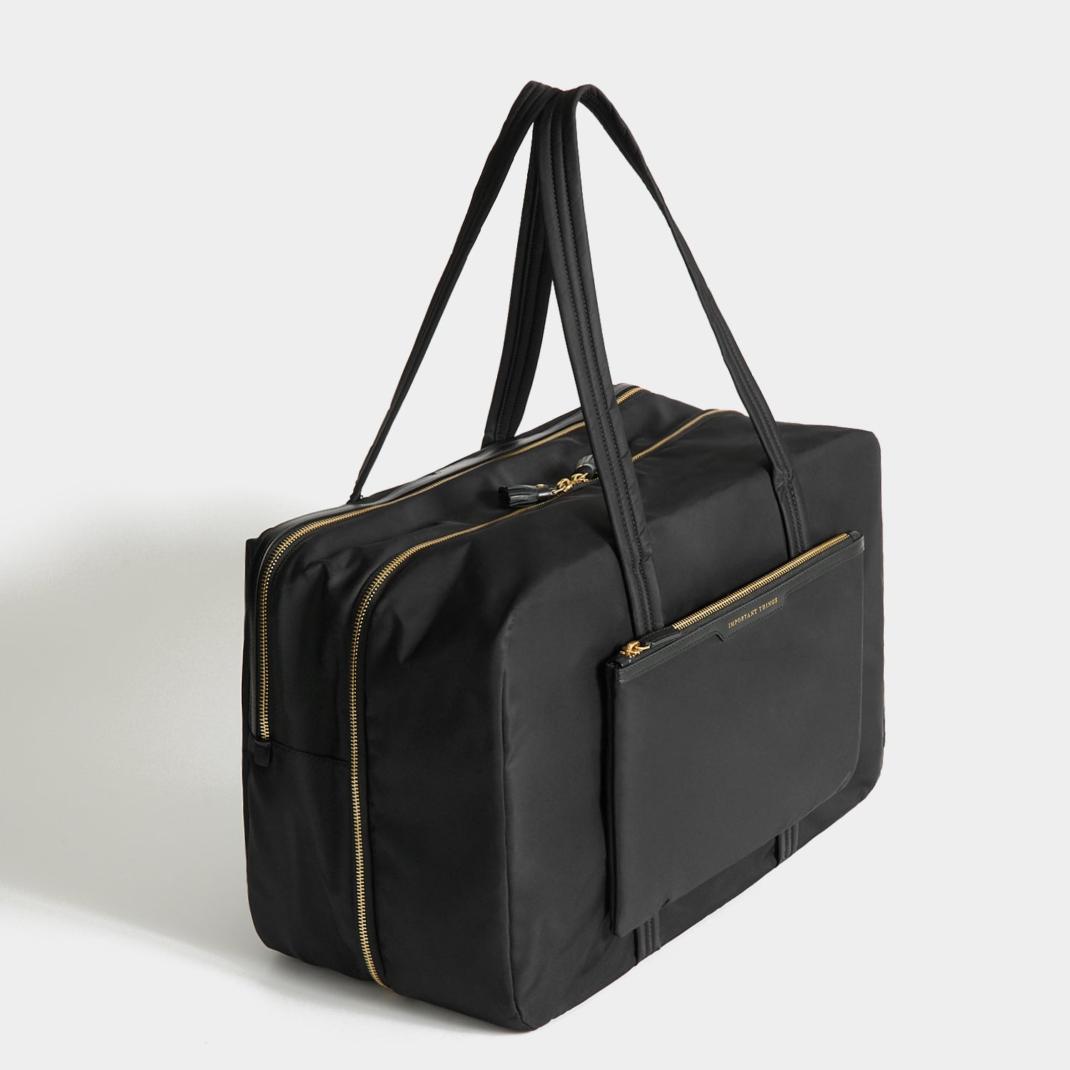 24 Hour Travel Bag -

          
            Regenerated ECONYL® in Black -
          

          Anya Hindmarch US
