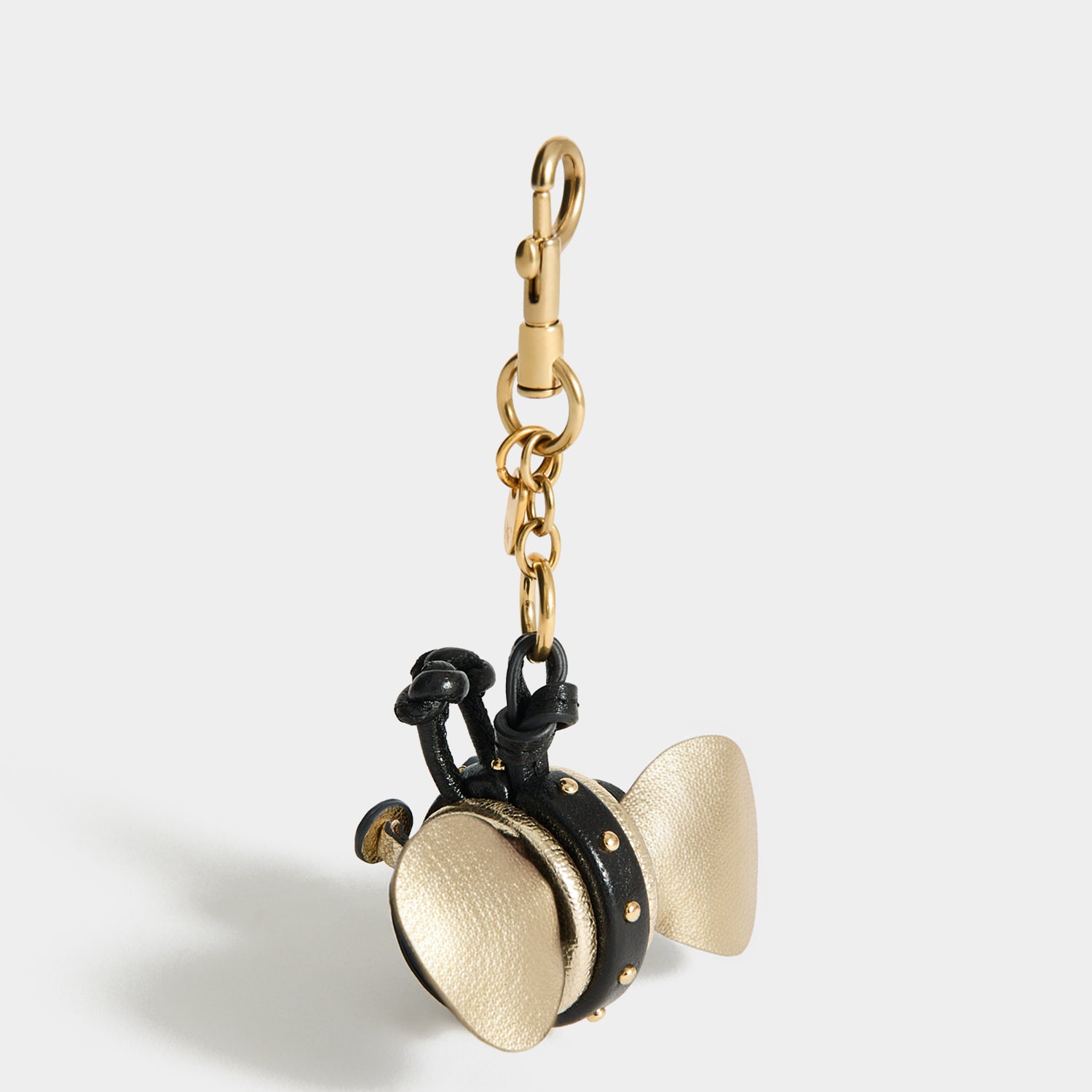 Bee Charm -

          
            Capra Leather in black -
          

          Anya Hindmarch US
