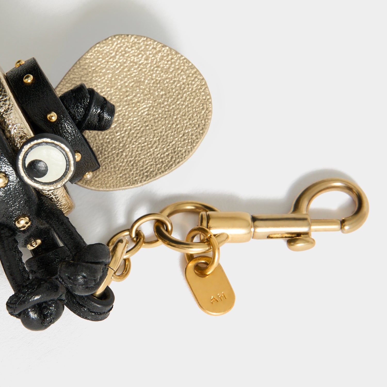 Bee Charm -

          
            Capra Leather in black -
          

          Anya Hindmarch US
