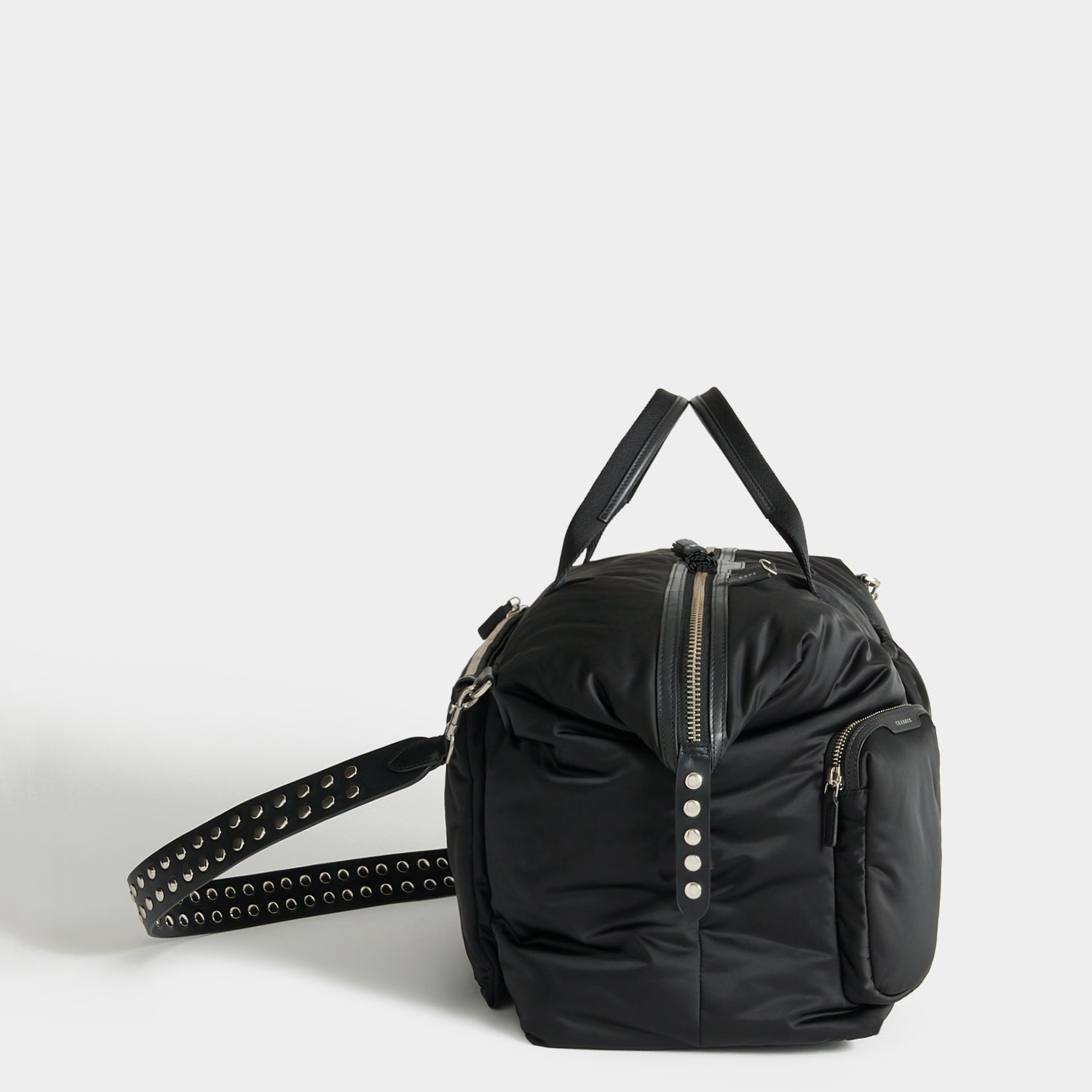 Studs In-Flight Maxi Travel Bag -

          
            Recycled Satin/Calf Leather in Black -
          

          Anya Hindmarch US
