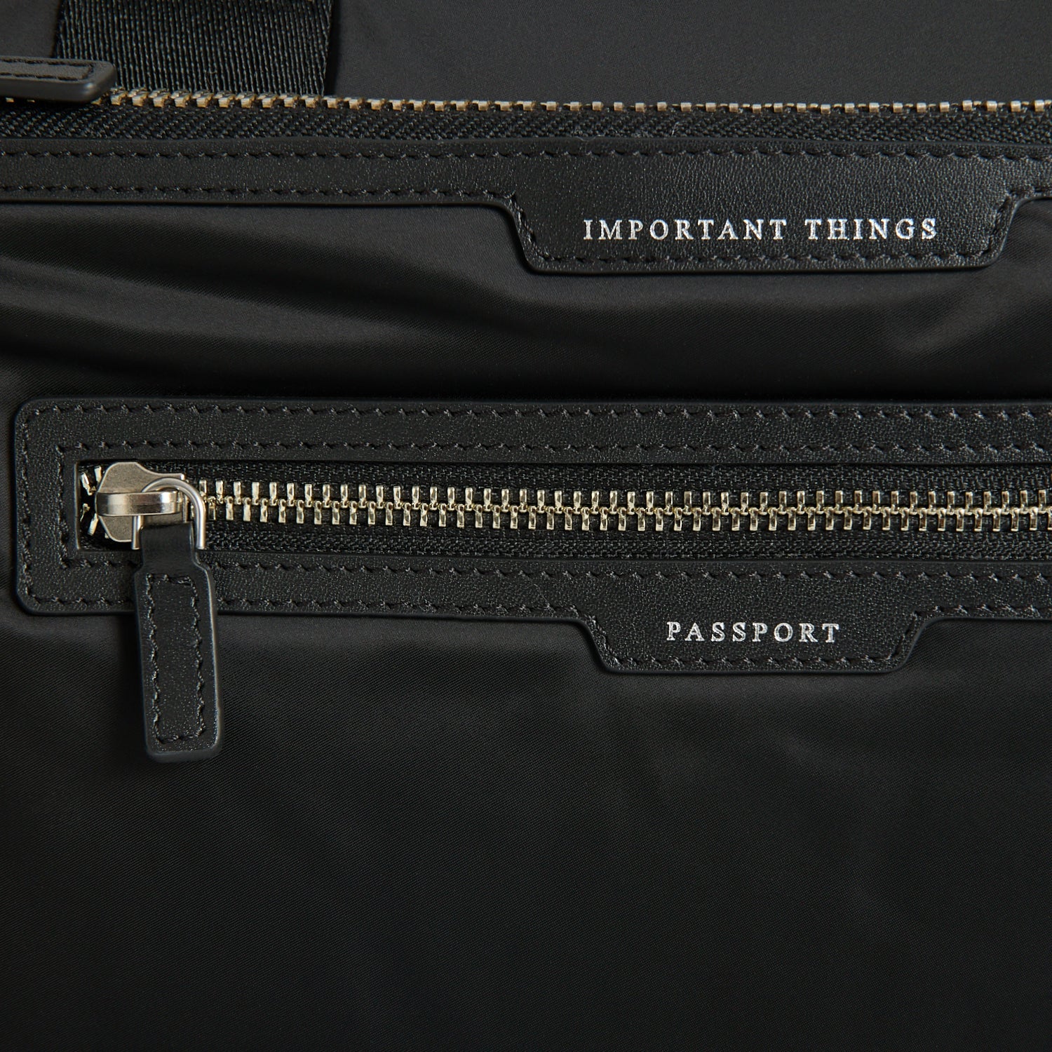 Studs In-Flight Maxi Travel Bag -

          
            Recycled Satin/Calf Leather in Black -
          

          Anya Hindmarch US
