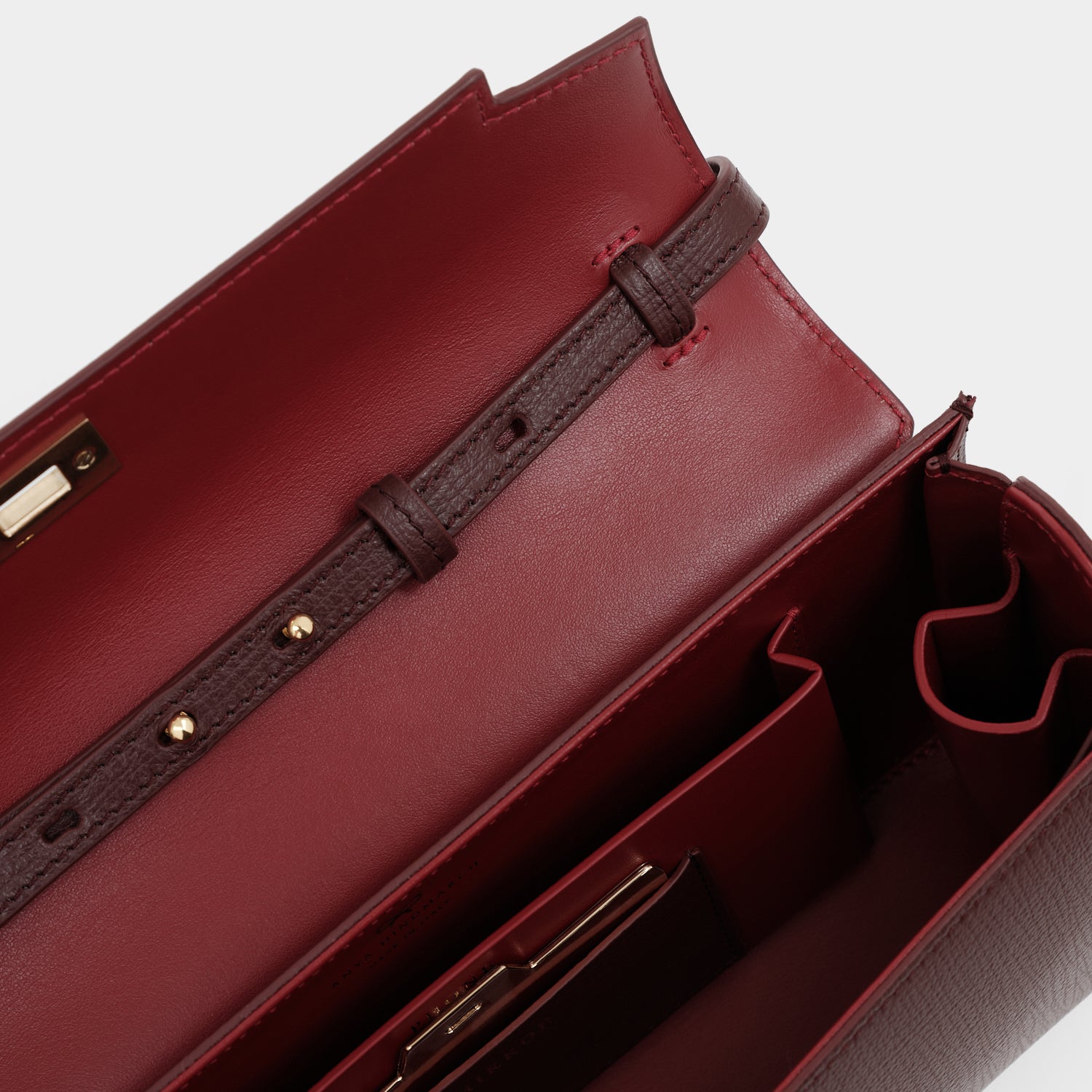 Mortimer Clutch -

          
            Crosshatch Leather in Barolo Red  -
          

          Anya Hindmarch US
