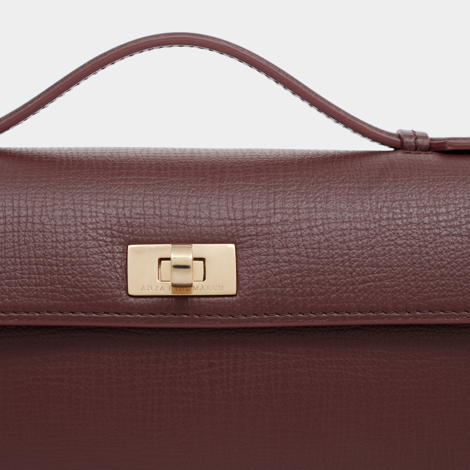Mortimer Clutch -

          
            Crosshatch Leather in Barolo Red  -
          

          Anya Hindmarch US
