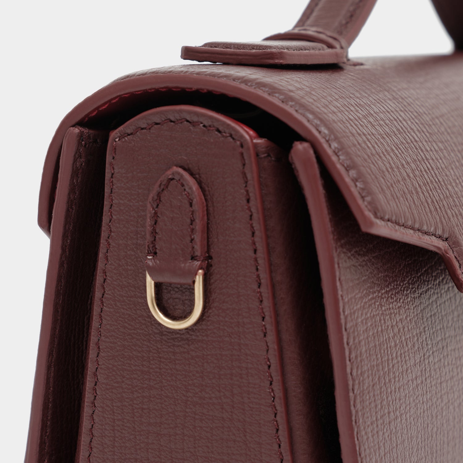 Mortimer Clutch -

          
            Crosshatch Leather in Barolo Red  -
          

          Anya Hindmarch US
