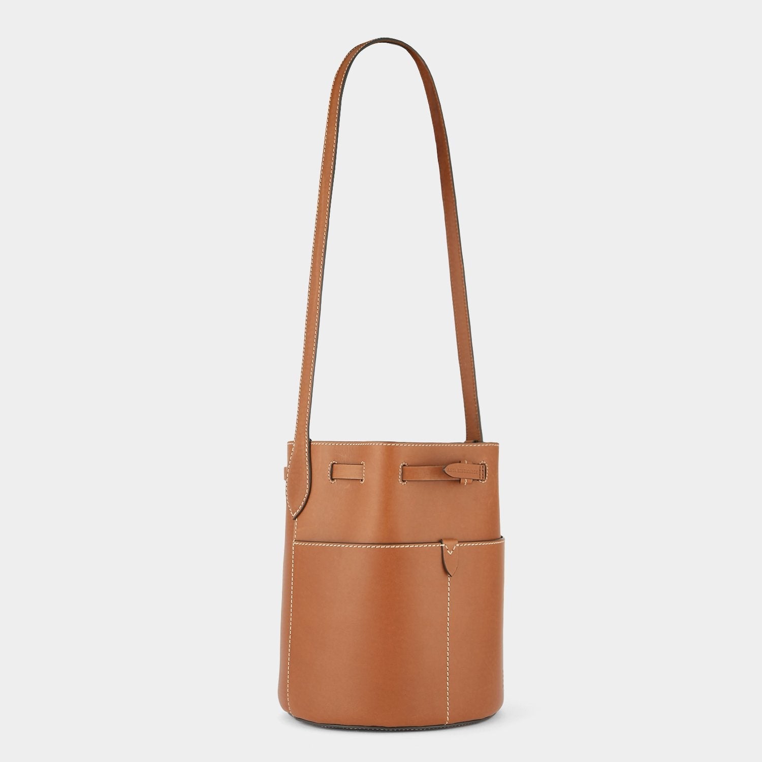 Return to Nature Small Bucket Bag -

          
            Compostable Leather in Tan -
          

          Anya Hindmarch US
