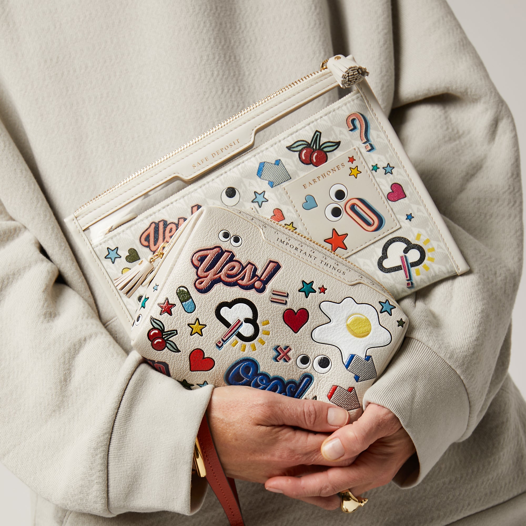 All Over Stickers Safe Deposit Case -

                  
                    Recycled Canvas in Chalk -
                  

                  Anya Hindmarch US
