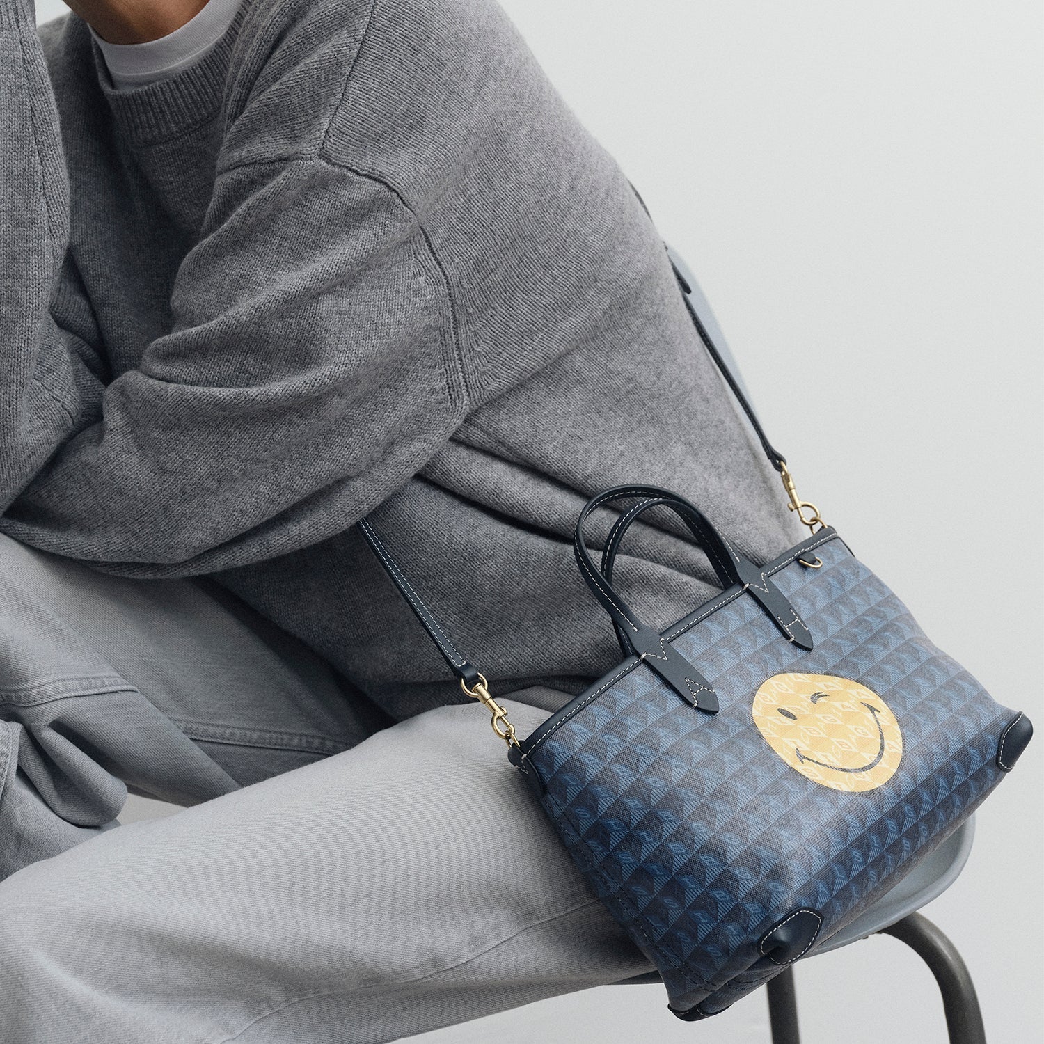 I am a Plastic Bag XS Wink Zipped Cross-body Tote -

          
            Recyled Canvas in Marine -
          

          Anya Hindmarch US
