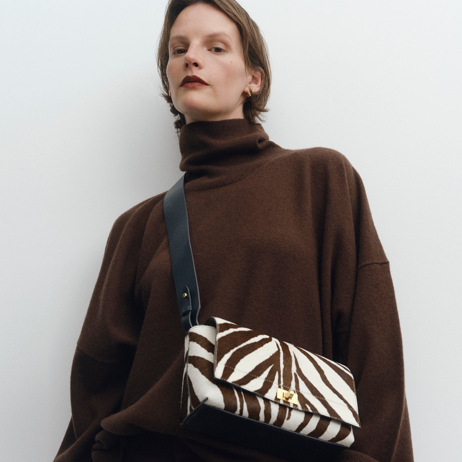 Mortimer Zebra Cross-body -

          
            Calf Hair/Leather in Ink Green -
          

          Anya Hindmarch US
