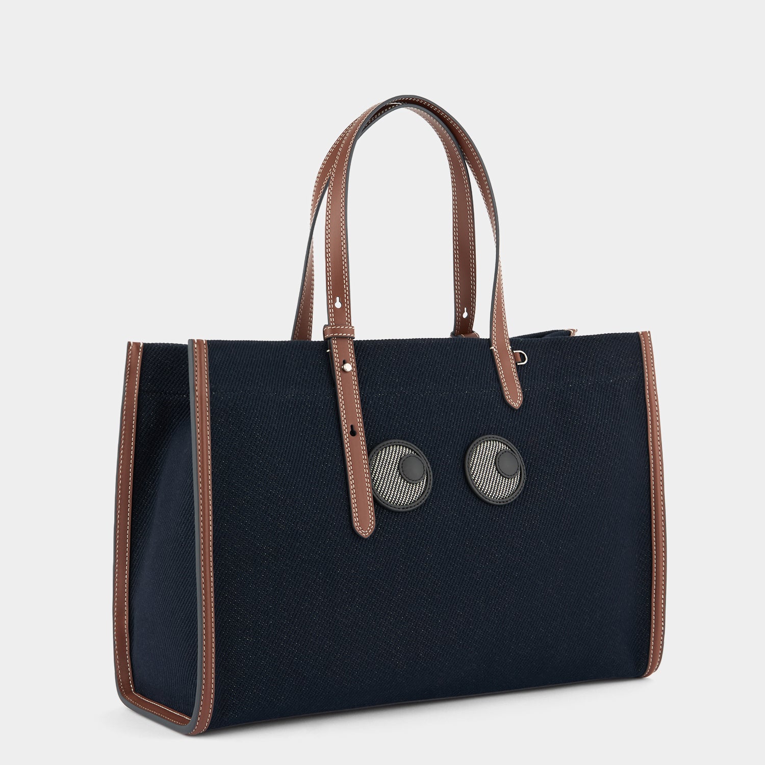 E/W Eyes Tote -

          
            Cotton Drill in Navy -
          

          Anya Hindmarch US
