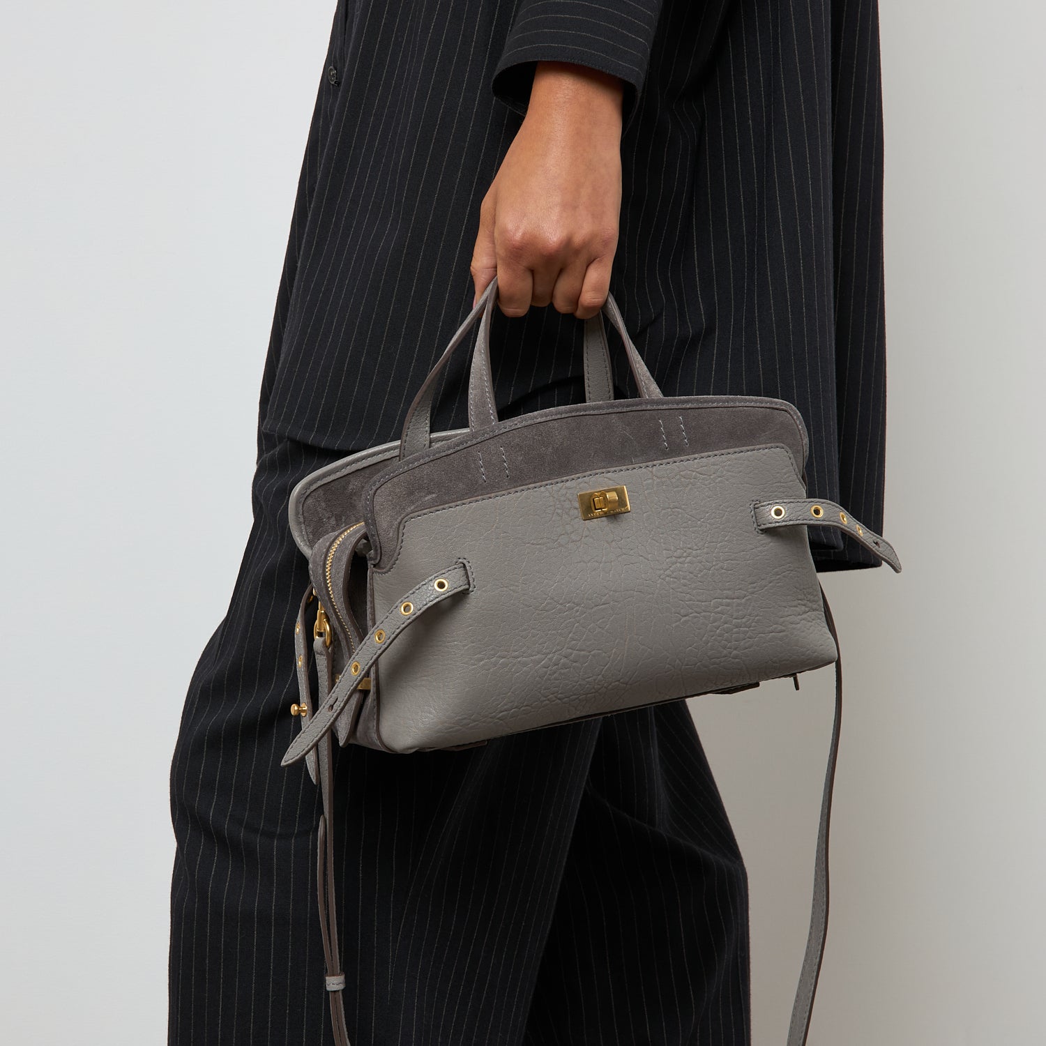 Wilson Eyelet Cross-body -

          
            Suede in Stone Grey -
          

          Anya Hindmarch US
