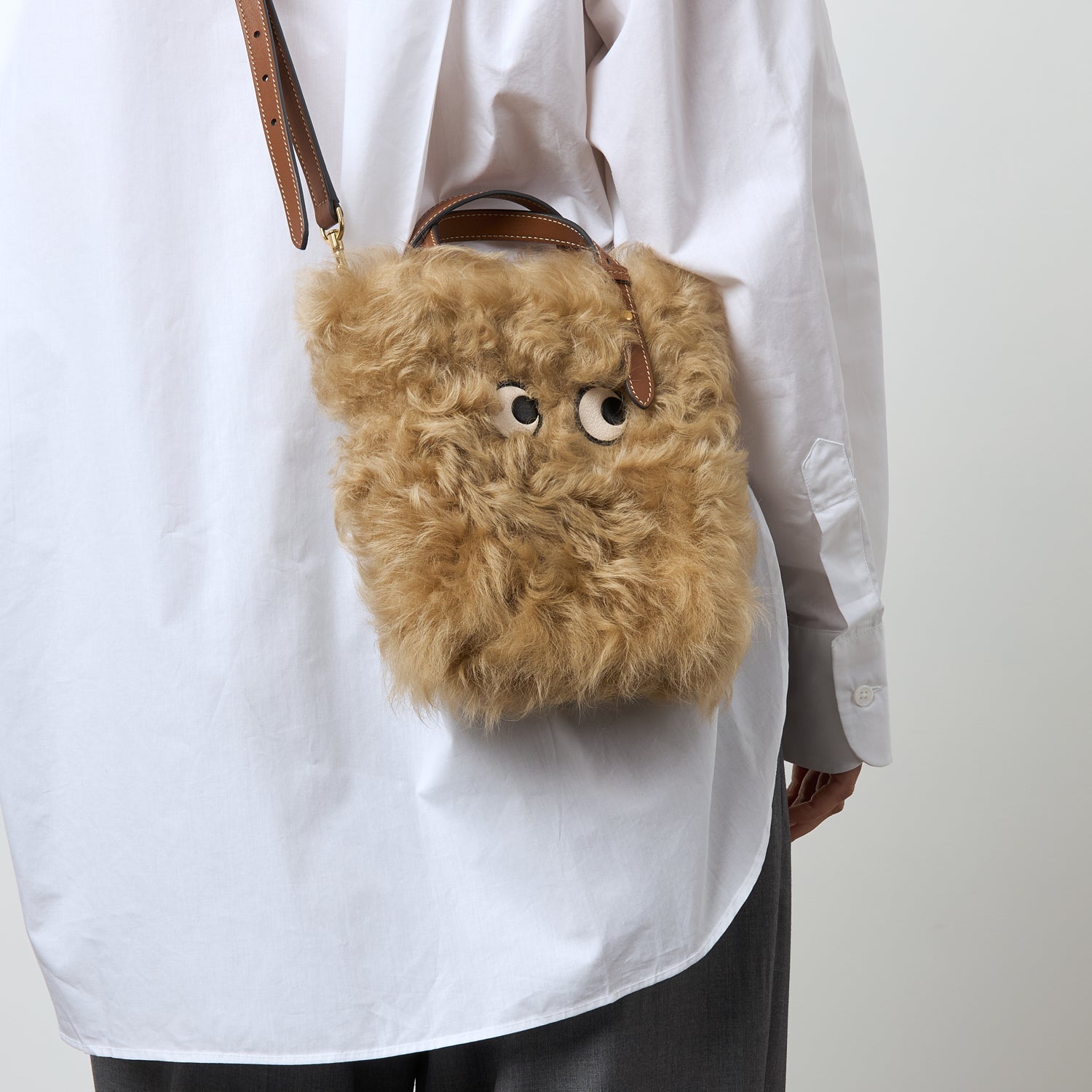N/S Mini Eyes Shearling Tote -

          
            Shearling/Smooth Leather in Taupe -
          

          Anya Hindmarch US
