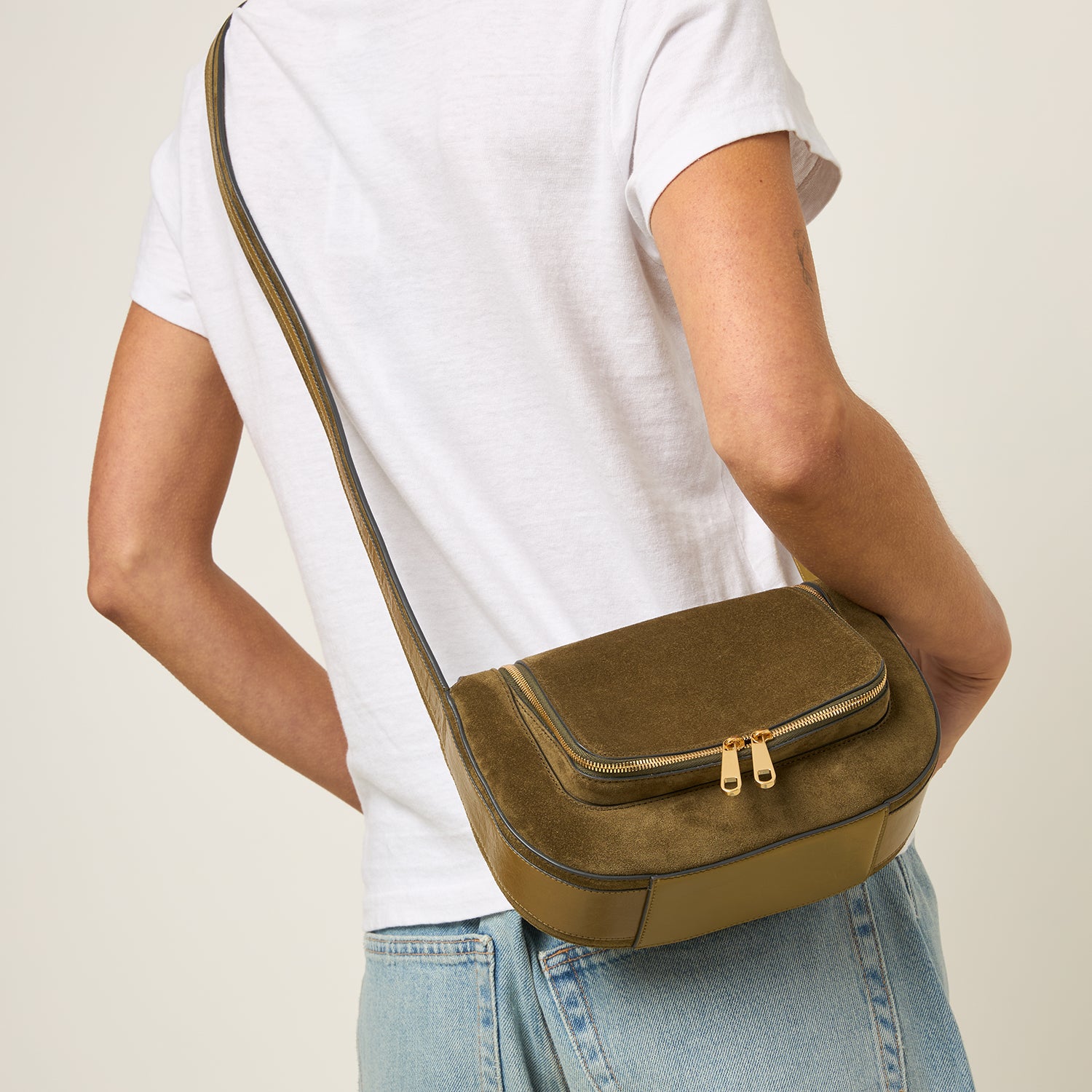 Green suede crossbody bag by Anya Hindmarch