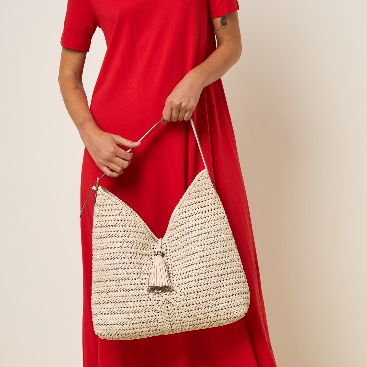 Neeson Tassel Hobo Bag -

          
            Capra Leather in Chalk -
          

          Anya Hindmarch US
