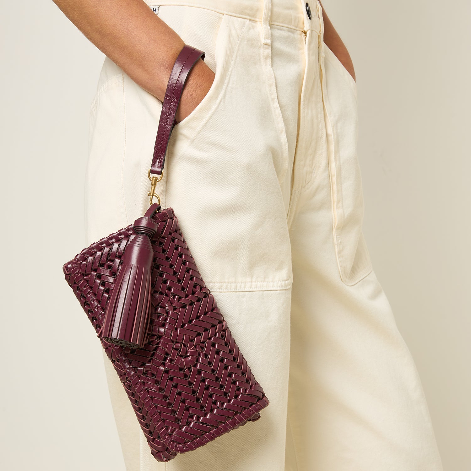 Neeson Tassel Clutch -

          
            Calf Leather in Orchid Purple -
          

          Anya Hindmarch US
