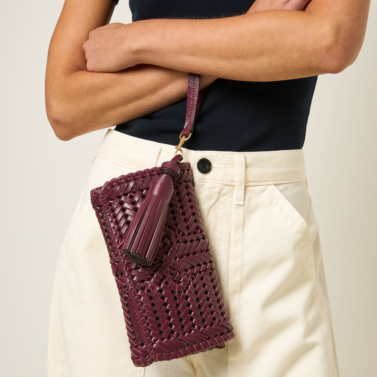Neeson Tassel Clutch -

          
            Calf Leather in Orchid Purple -
          

          Anya Hindmarch US
