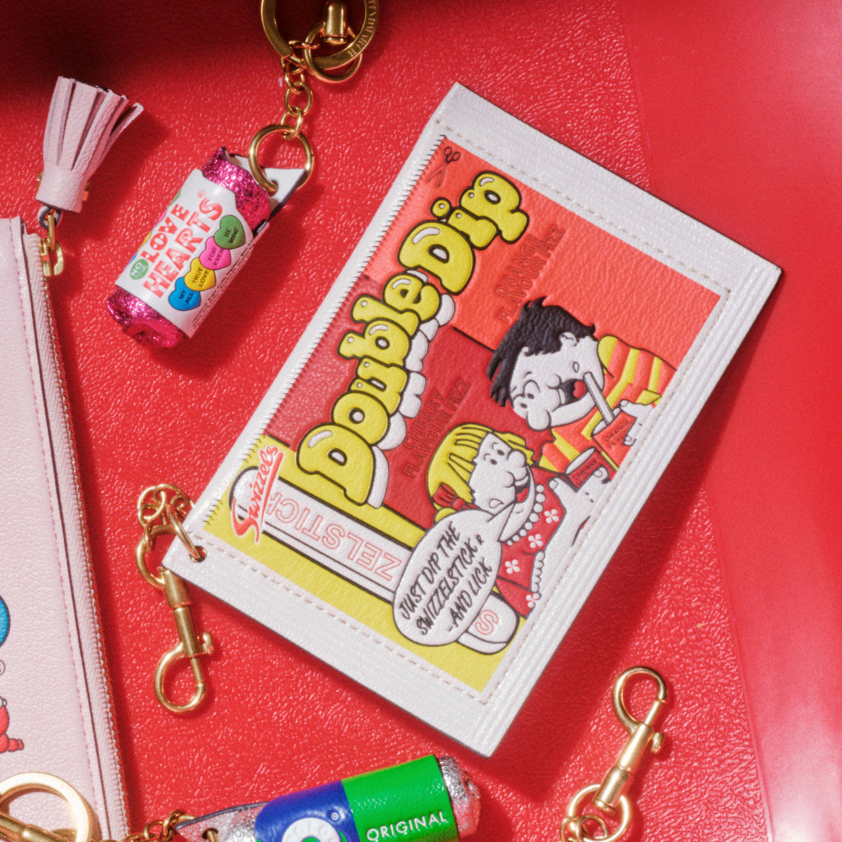 Anya Brands Double Dip Charm Earphone Case -

          
            Calf Leather in Optic White -
          

          Anya Hindmarch US
