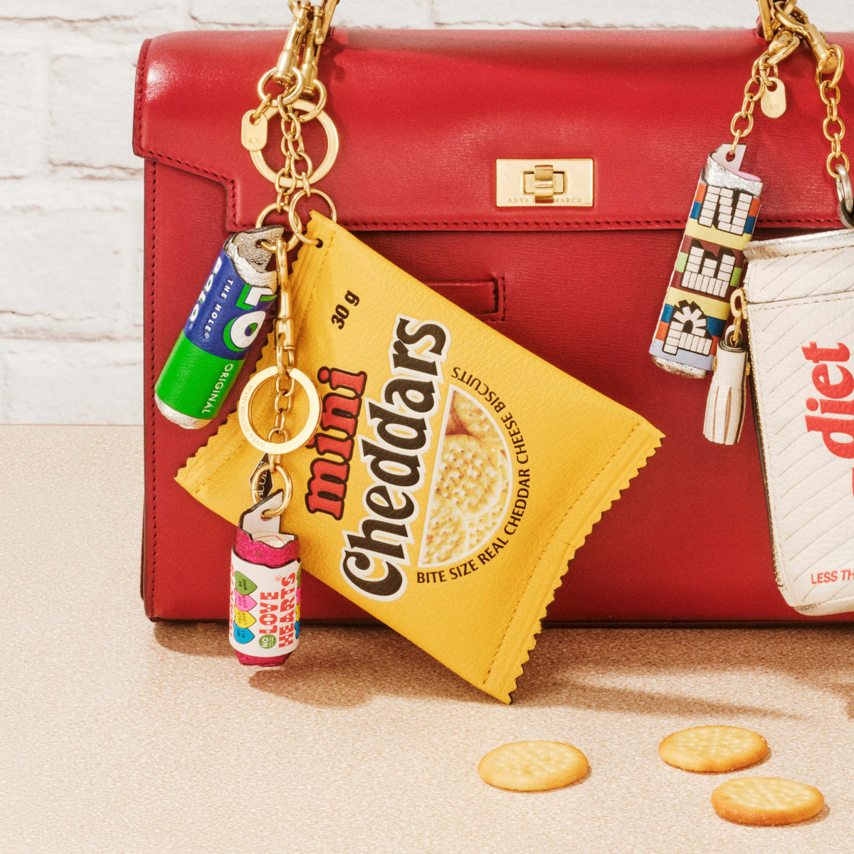 Anya Brands Jacob's Mini Cheddars Earphone Case Charm -

          
            Calf Leather in Lemon Curd Yellow -
          

          Anya Hindmarch US
