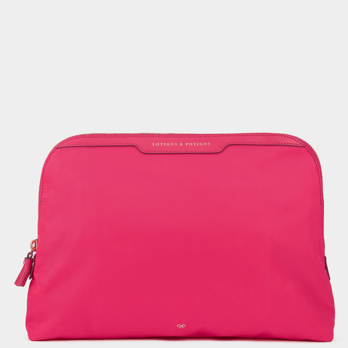 Lotions and Potions Pouch -

          
            Econyl® in Hot Pink -
          

          Anya Hindmarch US
