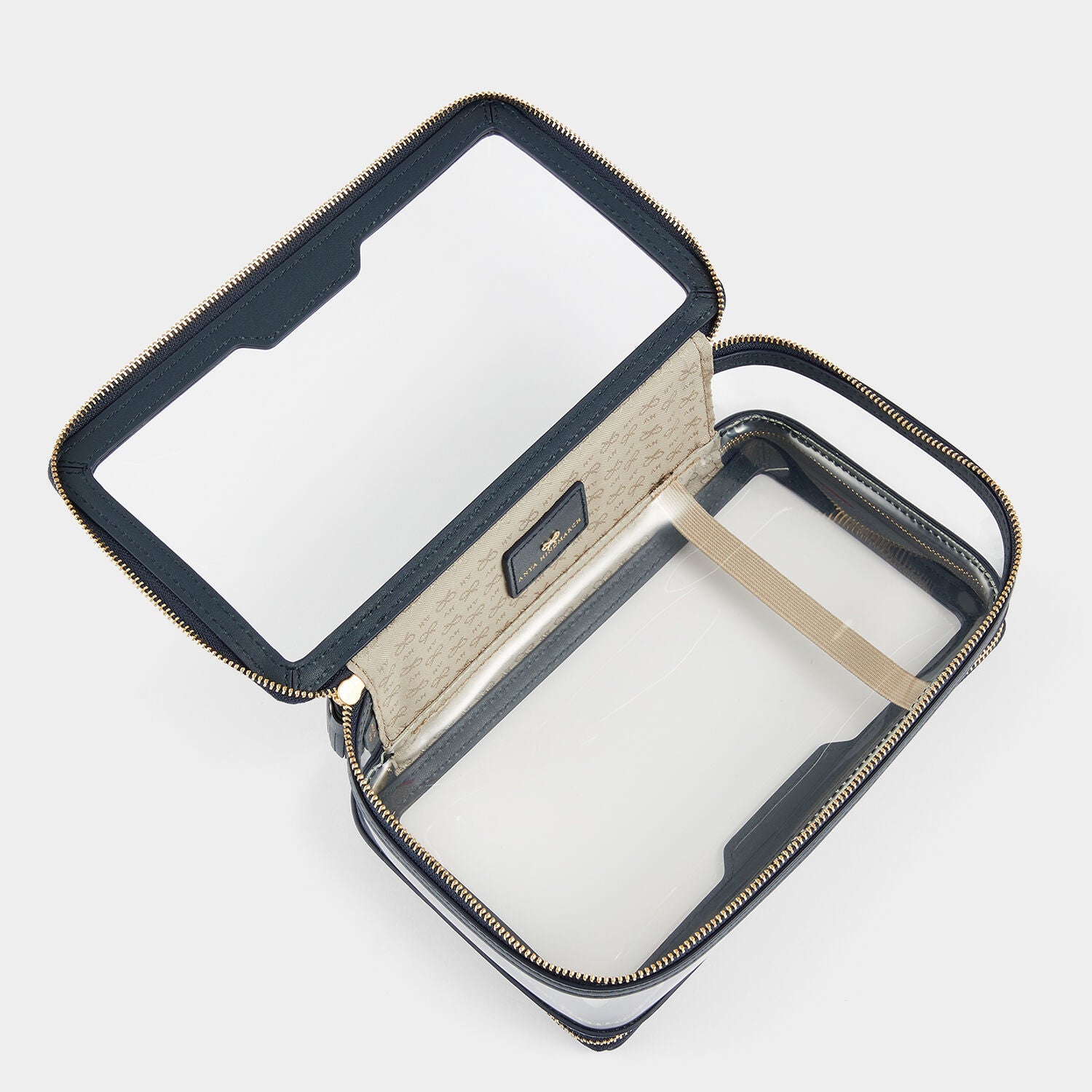 In-Flight Case -

          
            Capra in Clear/Marine -
          

          Anya Hindmarch US
