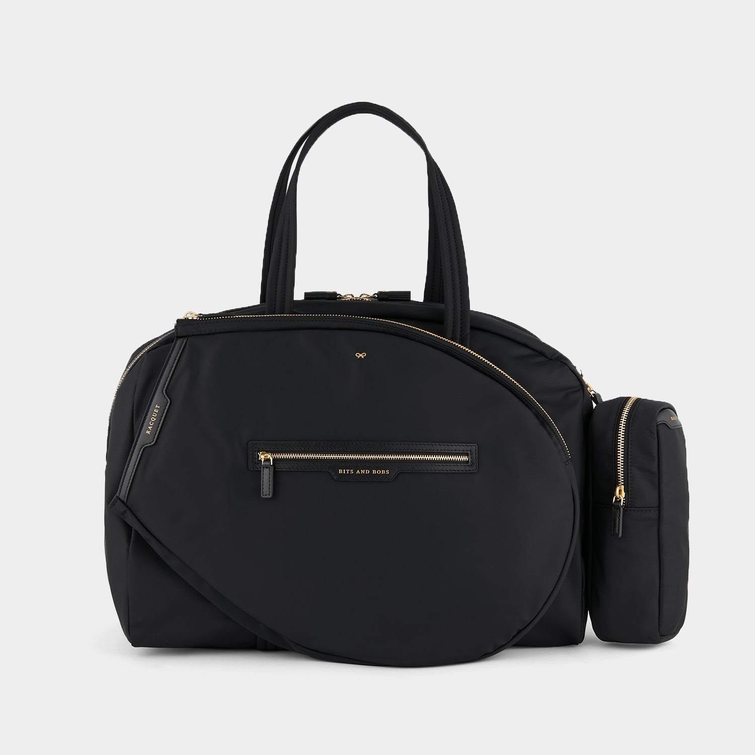 Tennis Bag -

          
            Econyl® Regenerated Nylon in Black -
          

          Anya Hindmarch US
