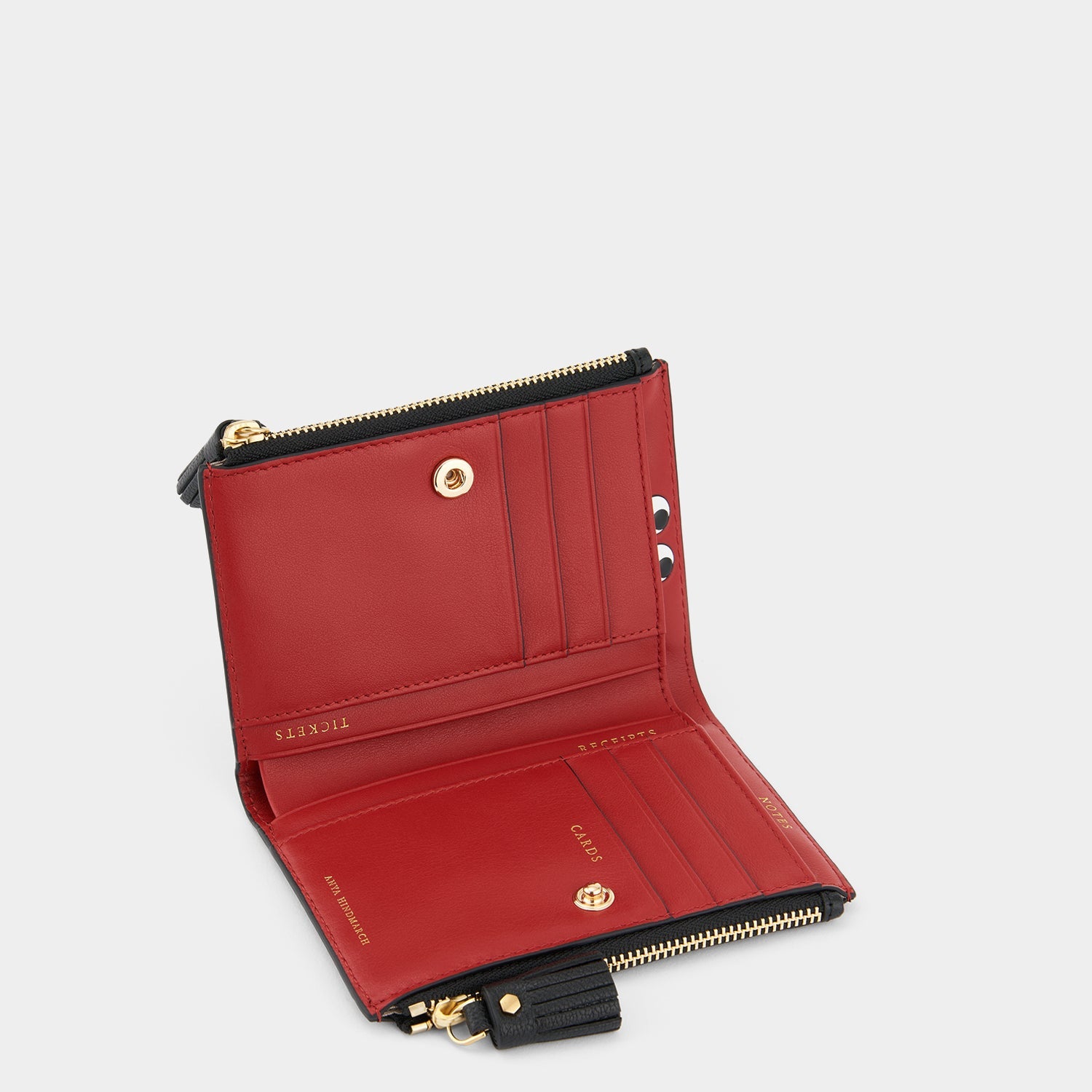 Peeping Eyes Small Double Zip Wallet -

          
            Capra Leather in Black -
          

          Anya Hindmarch US
