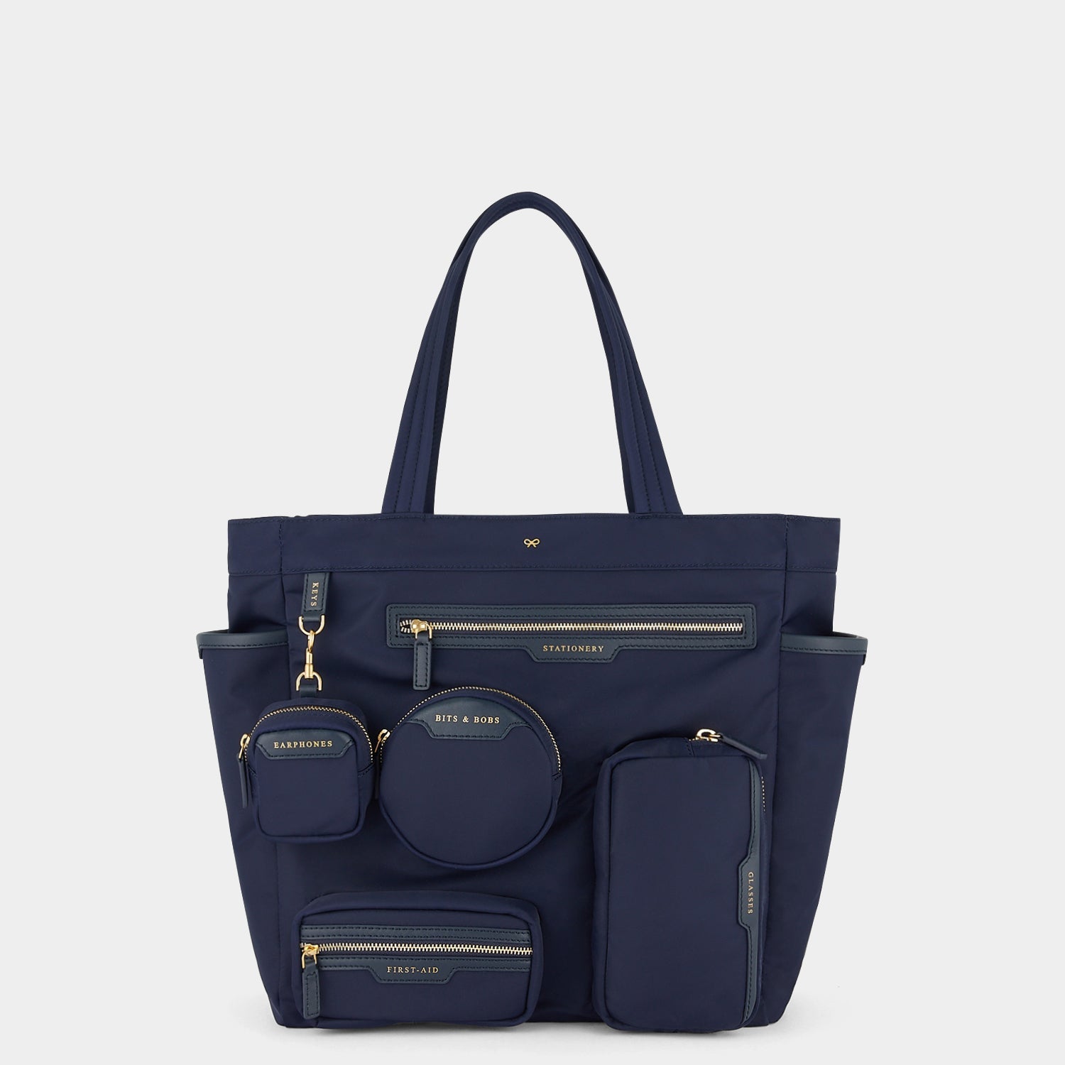 Commuter Tote -

          
            Regenerated Econyl® in Marine -
          

          Anya Hindmarch US
