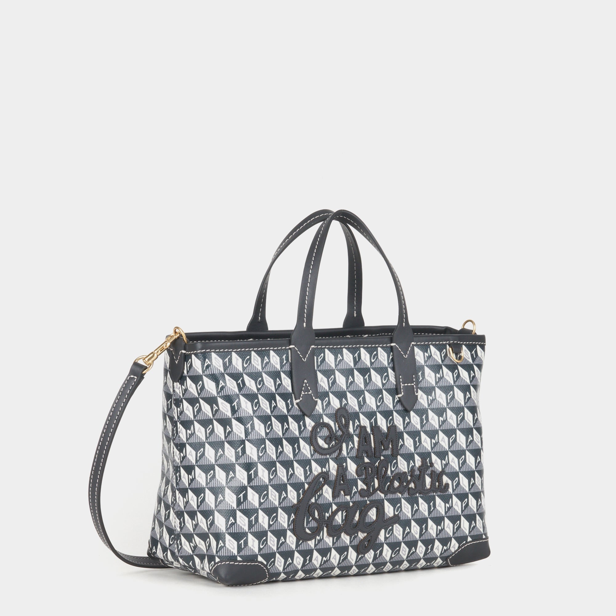 I Am A Plastic Bag XS Motif Tote -

                  
                    Recycled Canvas in Charcoal -
                  

                  Anya Hindmarch US
