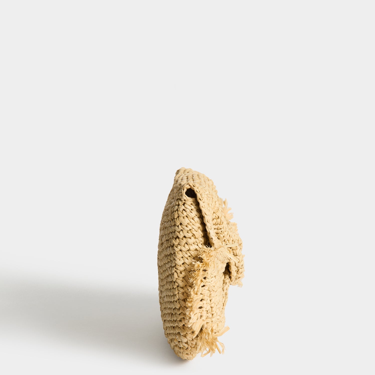 Raffia Bow Clutch -

          
            Raffia in Natural -
          

          Anya Hindmarch US
