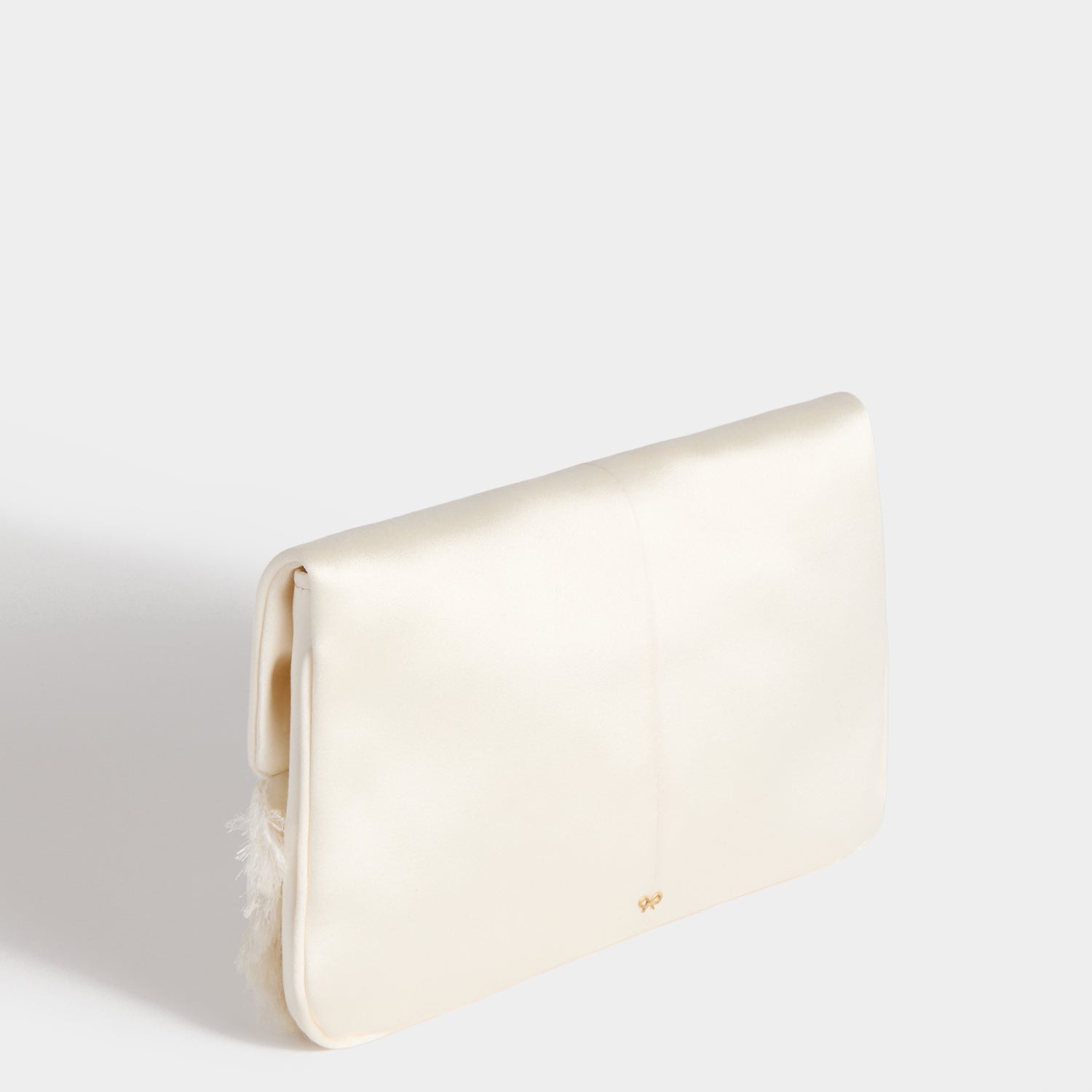 Bow Clutch -

          
            Double Satin in Ivory -
          

          Anya Hindmarch US
