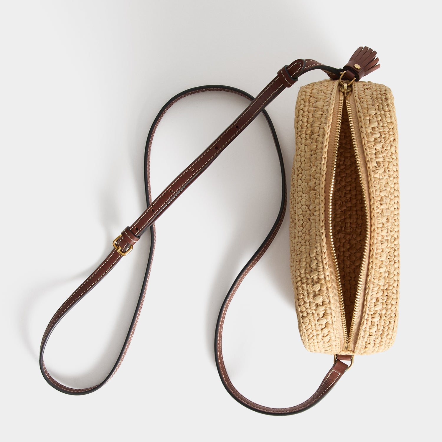 Raffia Eyes Cross-body -

          

          Anya Hindmarch US
