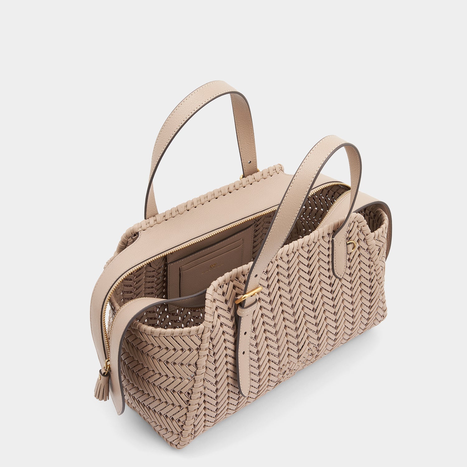Neeson Zip Top Bag -

                  
                    Capra Leather in Light Nude -
                  

                  Anya Hindmarch US
