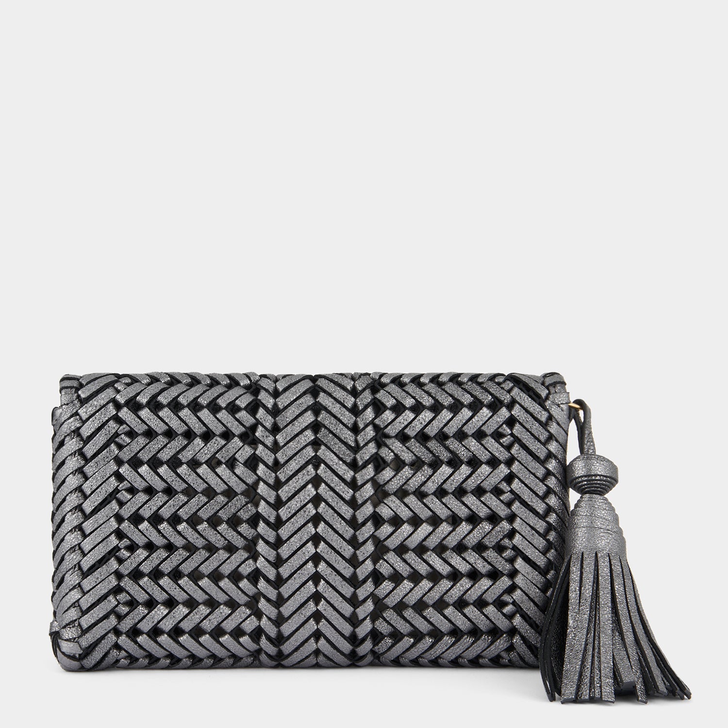 Neeson Tassel Clutch -

                  
                    Metallic Leather in Anthracite -
                  

                  Anya Hindmarch US

