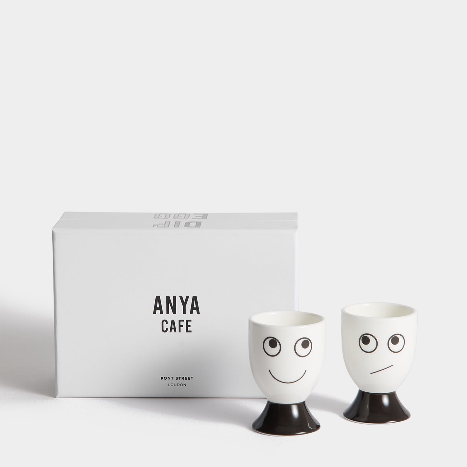 Eyes Egg Cup Set -

          
            Bone China in White -
          

          Anya Hindmarch US
