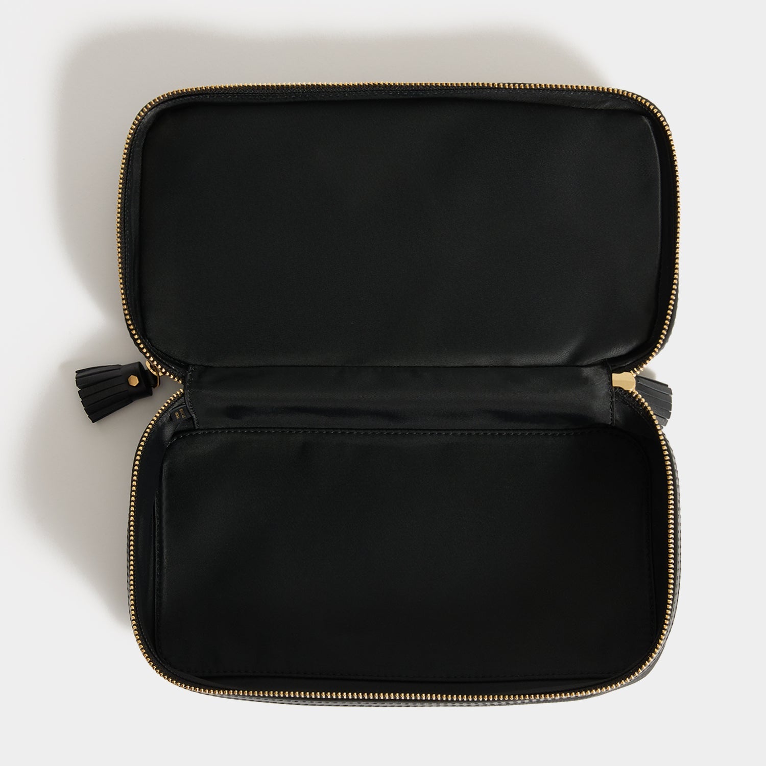 Logo Make-Up Pouch -

          
            Jacquard Nylon in Black -
          

          Anya Hindmarch US

