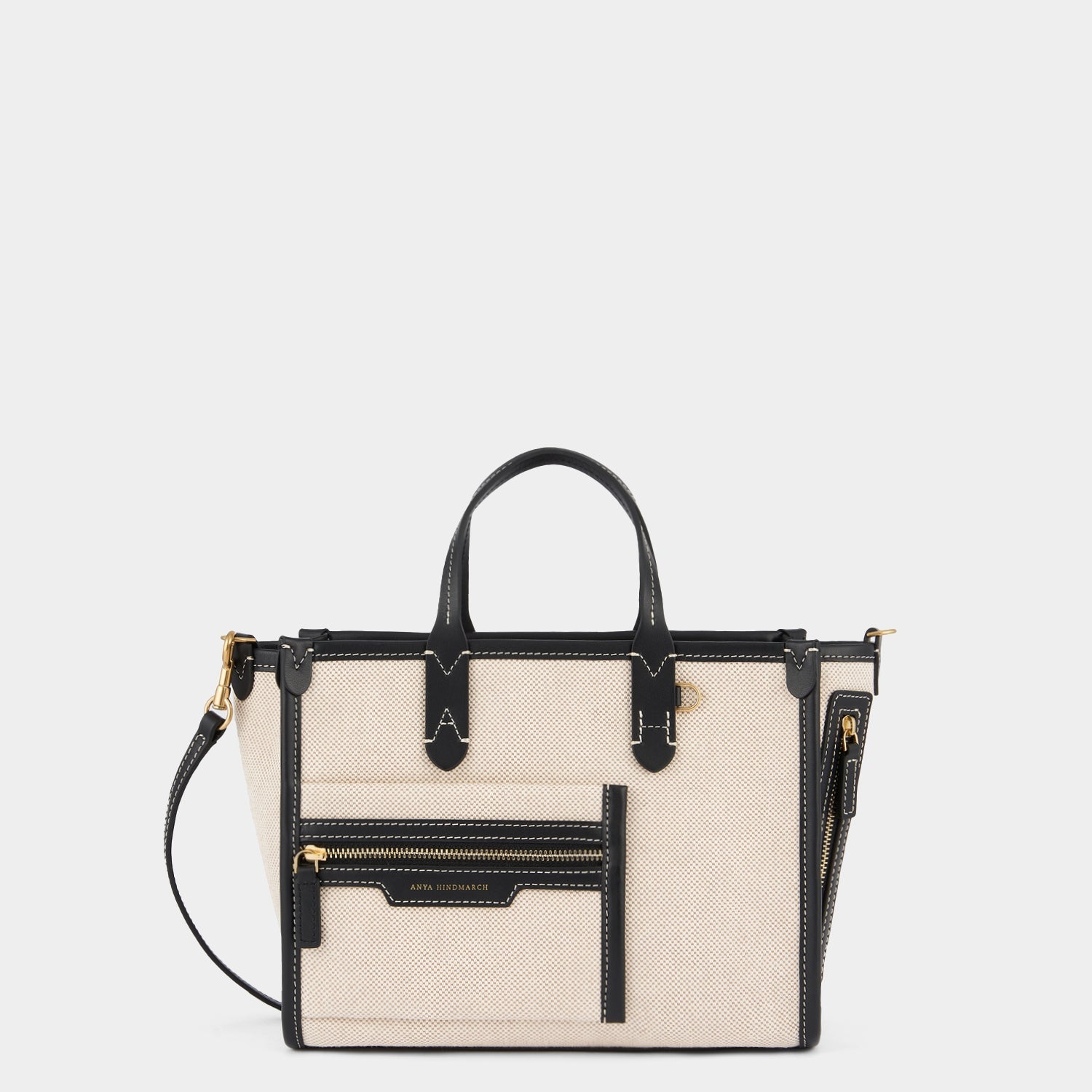 Pocket XS Cross-body Tote -

          
            Mixed Canvas in Natural -
          

          Anya Hindmarch US
