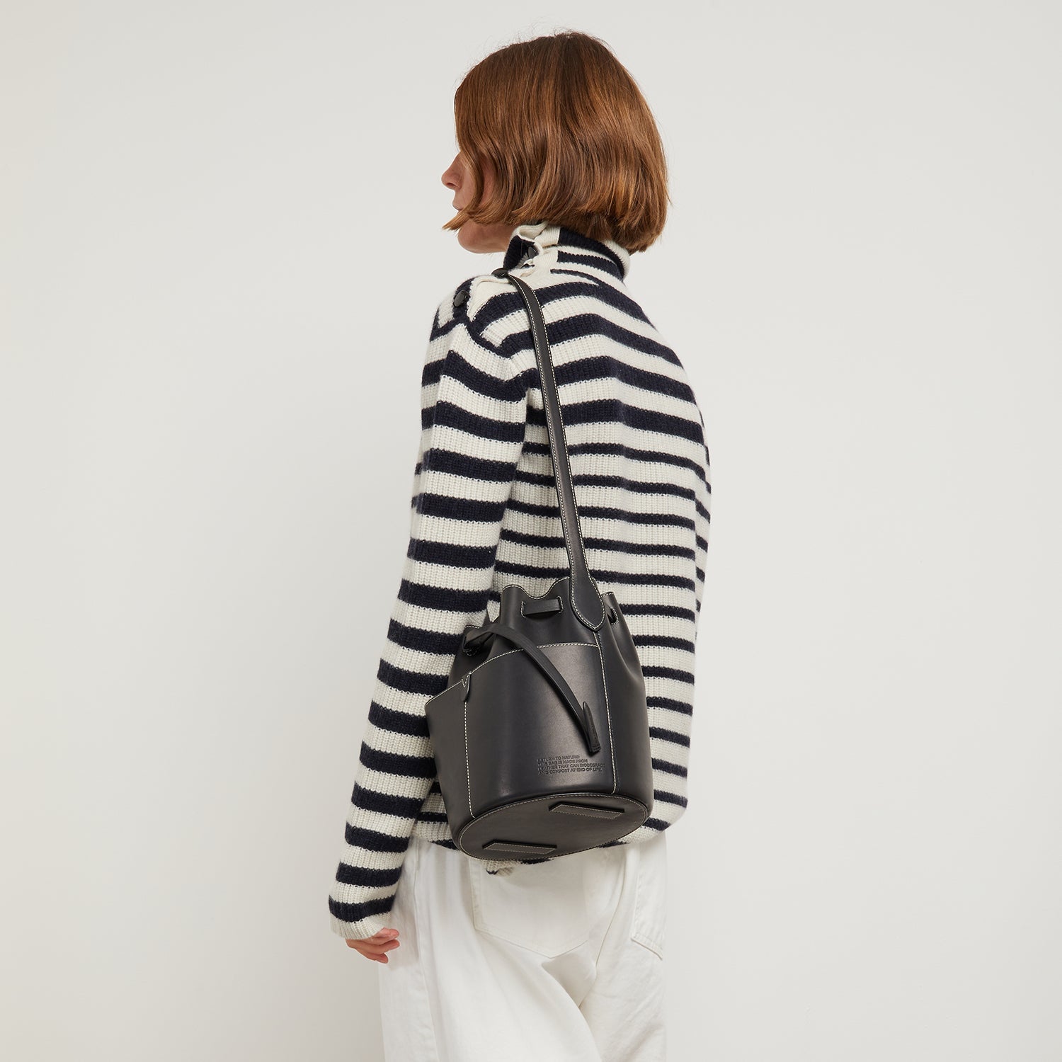 Return to Nature Small Bucket Bag -

                  
                    Compostable Leather in Black -
                  

                  Anya Hindmarch US
