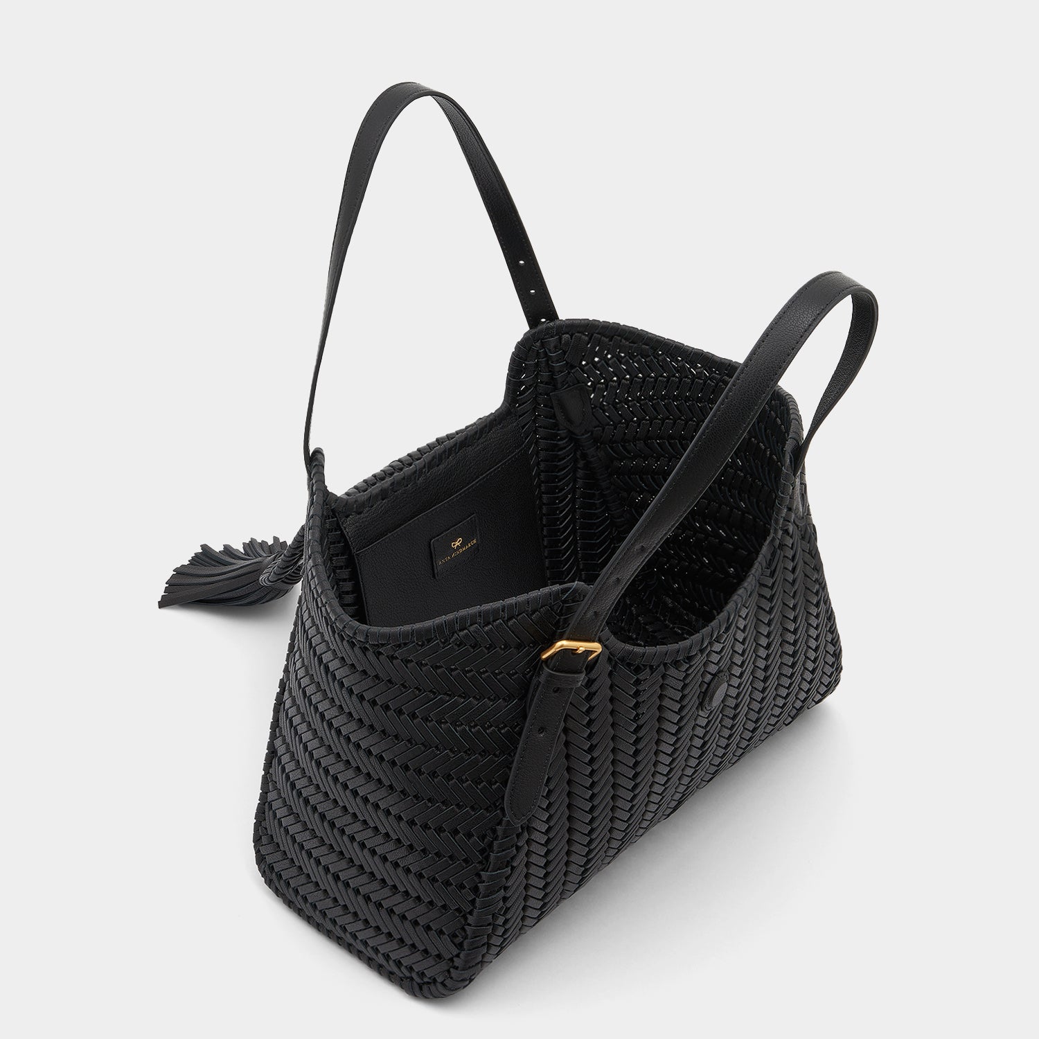Neeson Tassel Tote -

                  
                    Capra Leather in Black -
                  

                  Anya Hindmarch US
