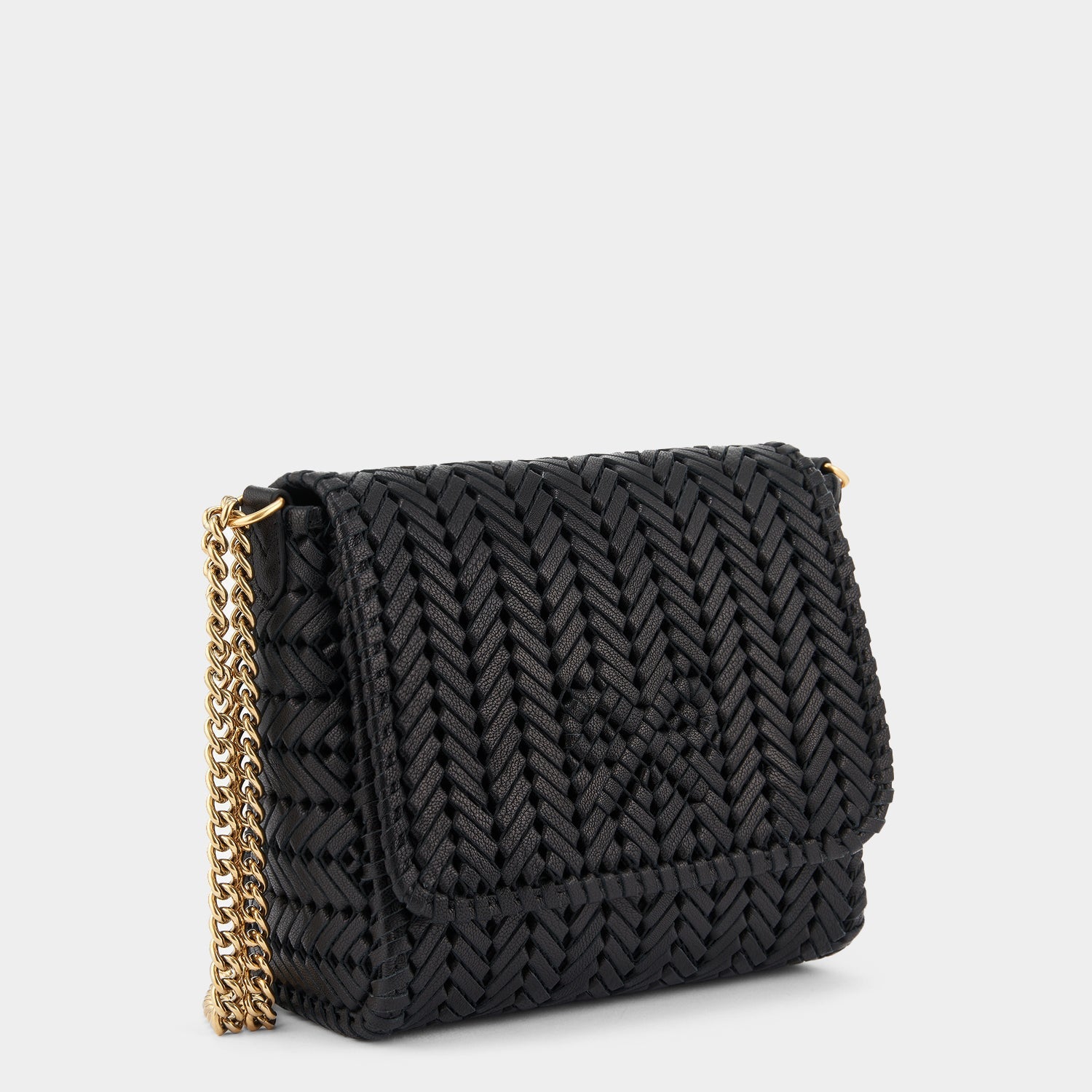 Neeson Chain Cross-body -

                  
                    Capra Leather in Black -
                  

                  Anya Hindmarch US
